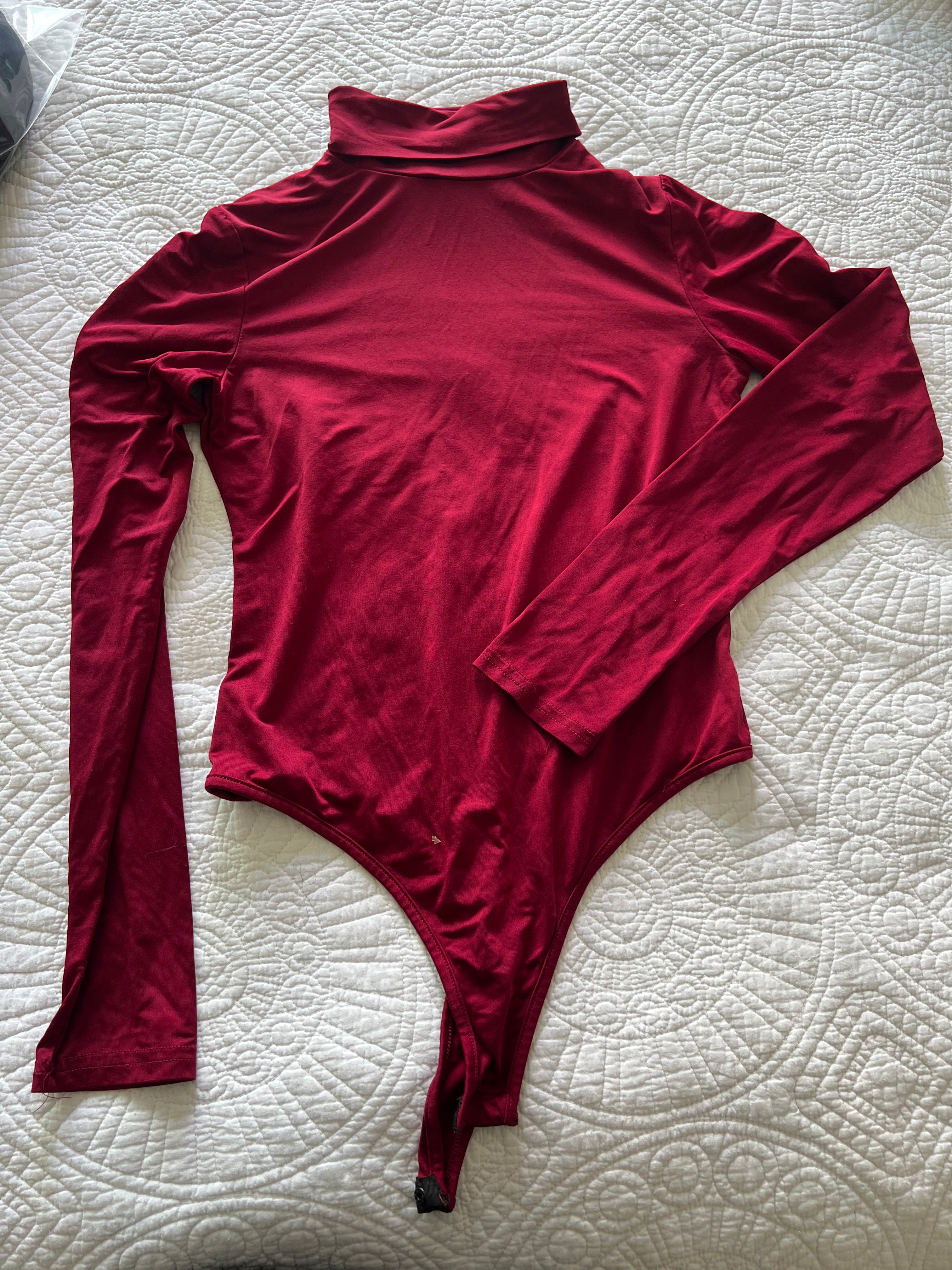Red turtle neck bodysuit
