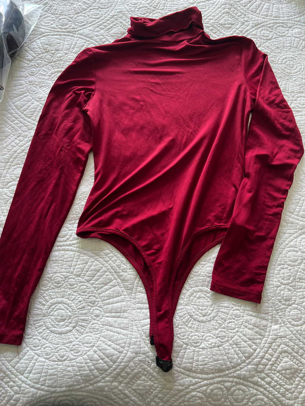 Red turtle neck bodysuit