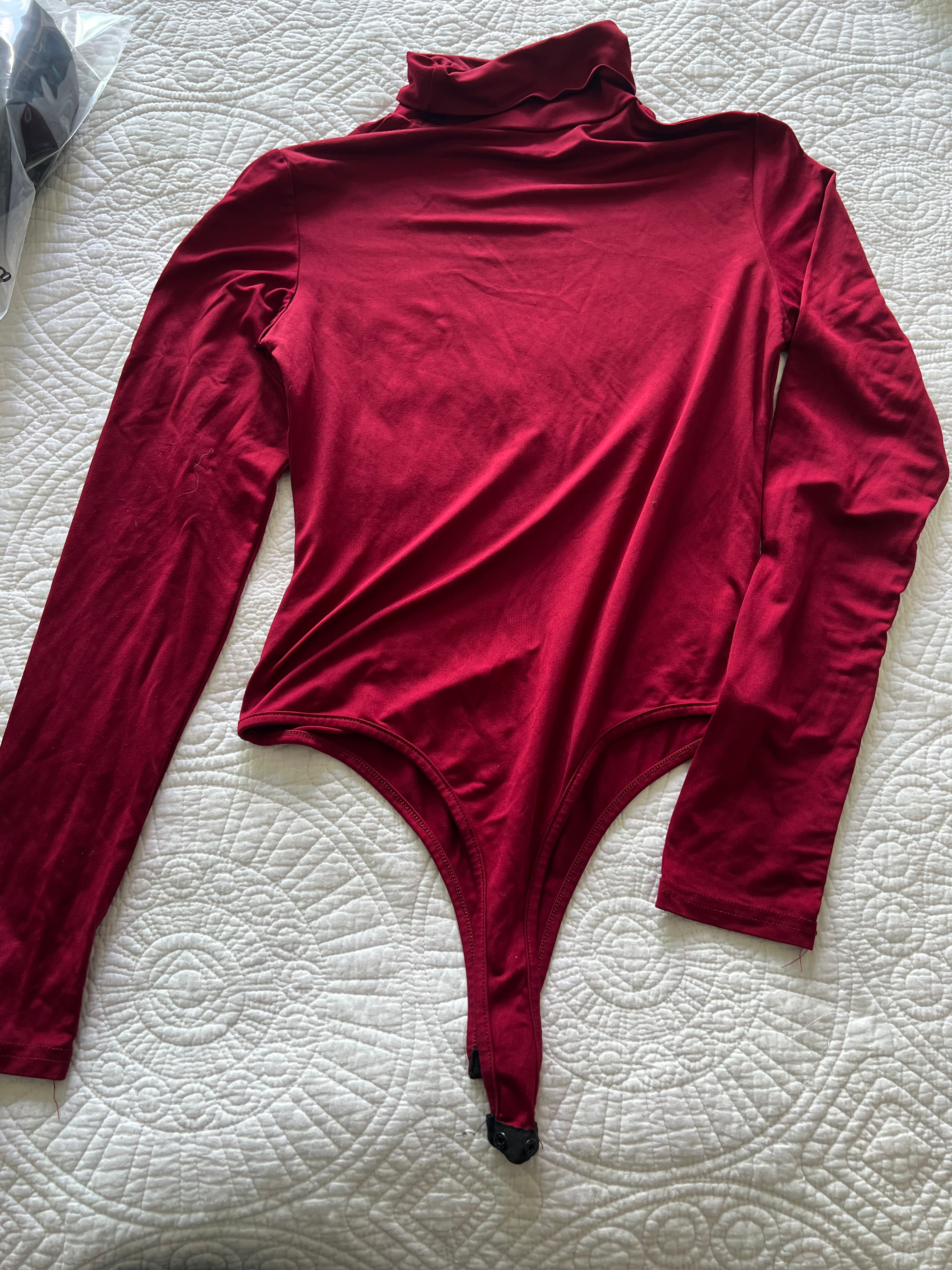 Red turtle neck bodysuit