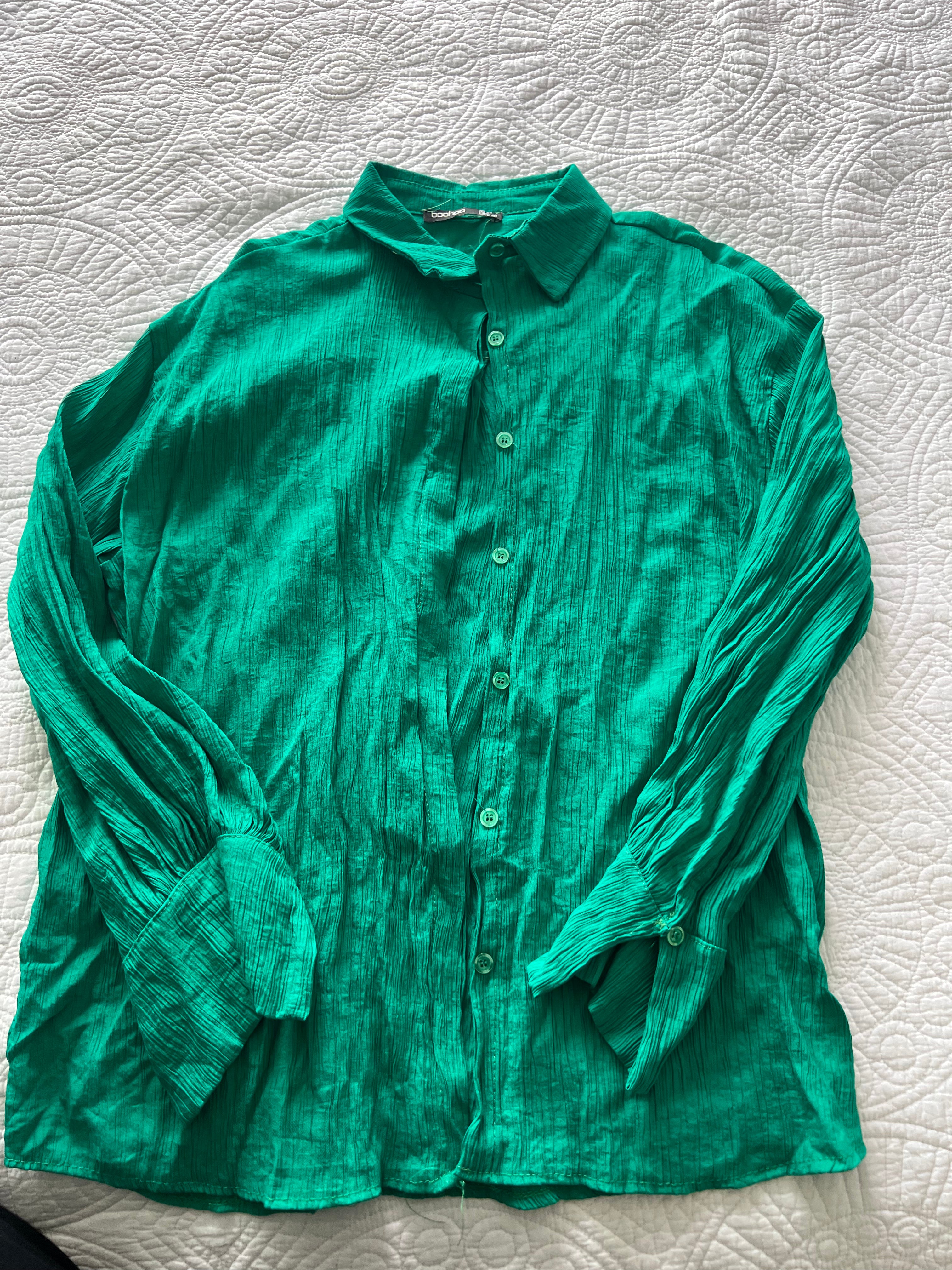 Green button up shirt
