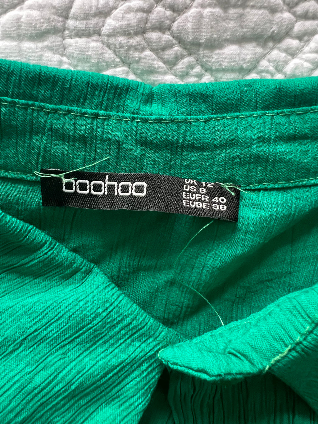 Green button up shirt