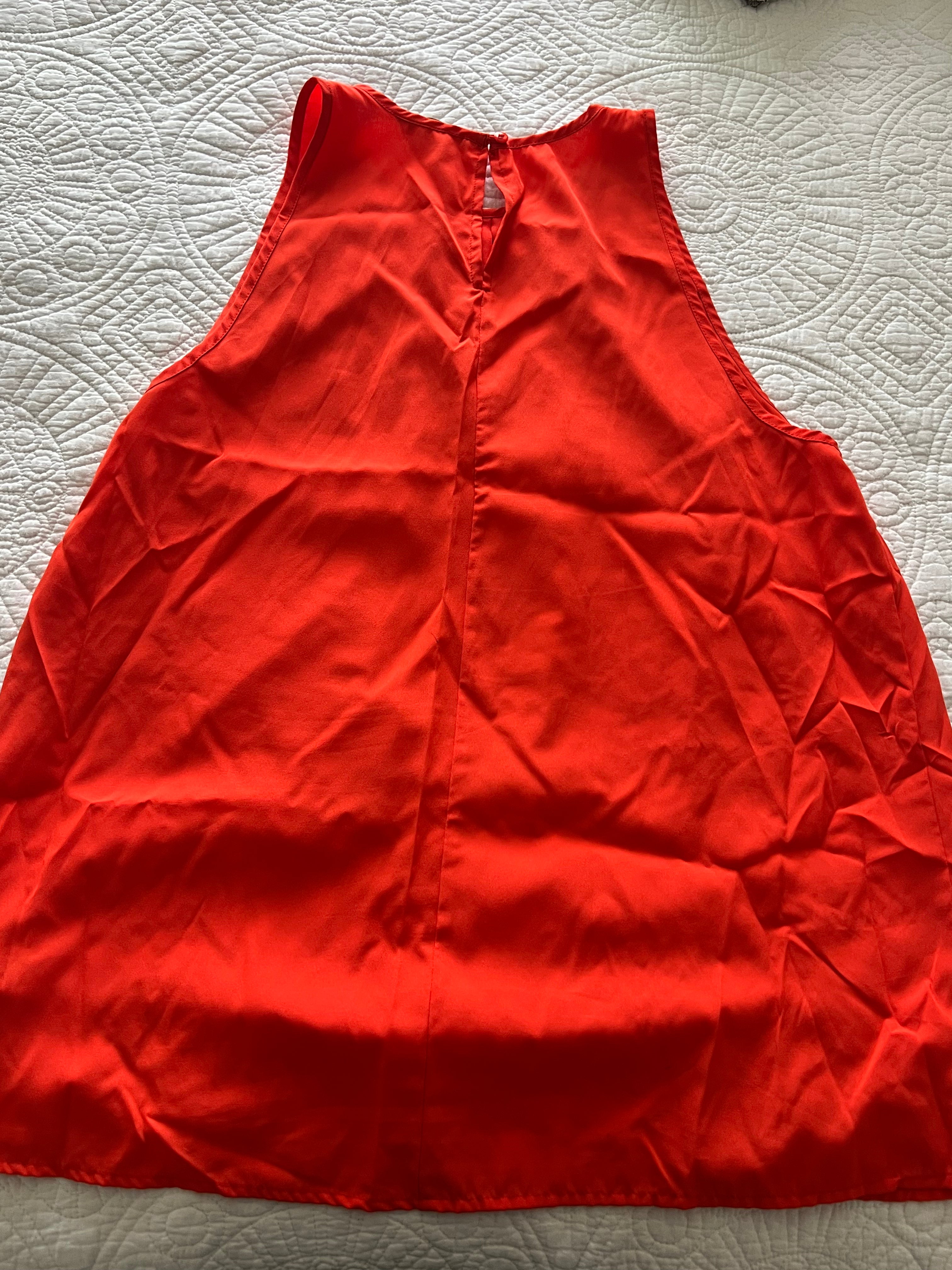 Orange flowy top