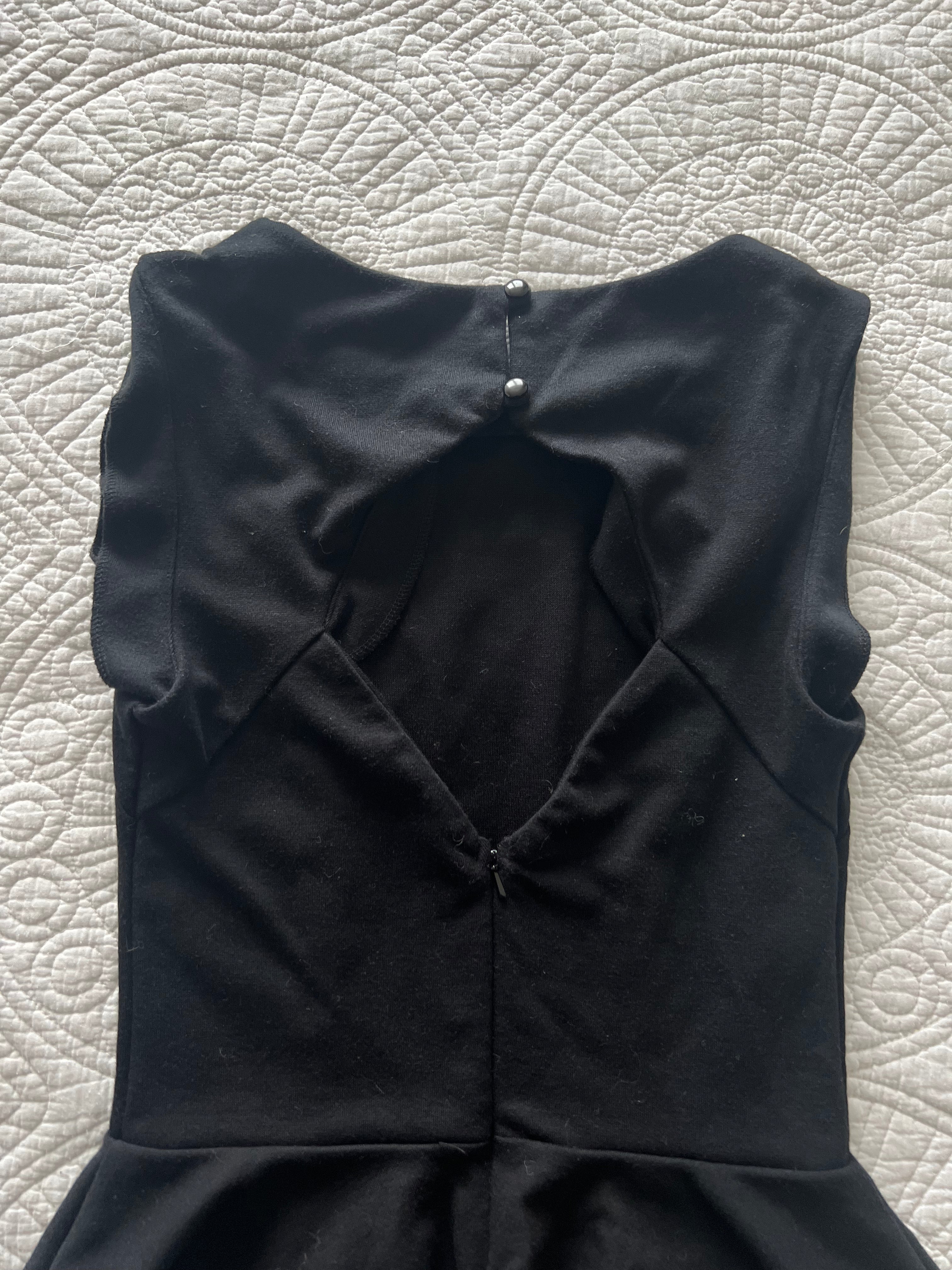 Black peplum top
