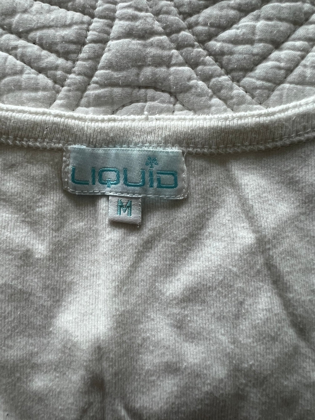 White vest top
