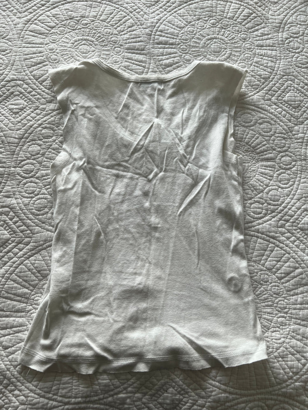 White vest top