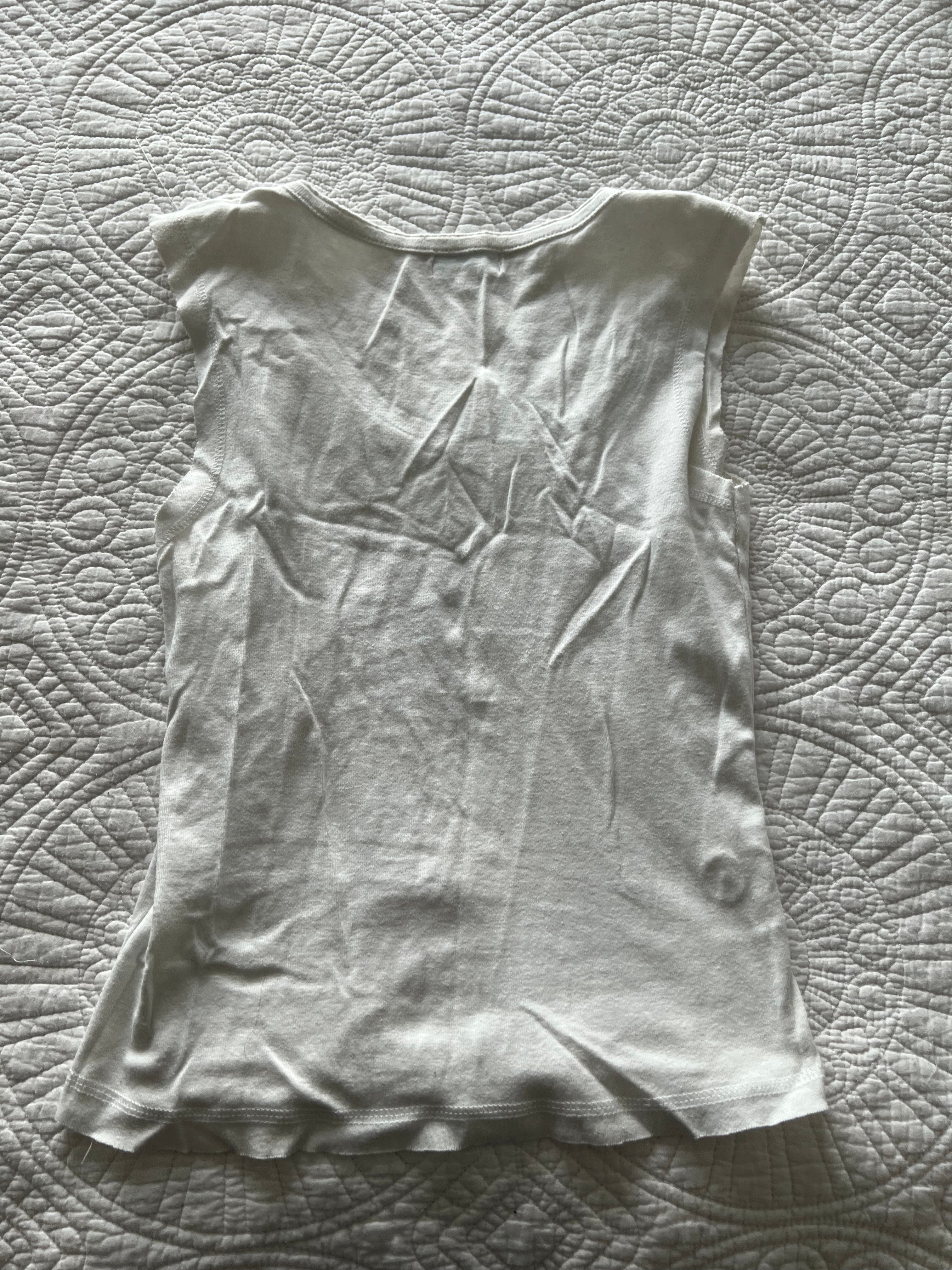 White vest top