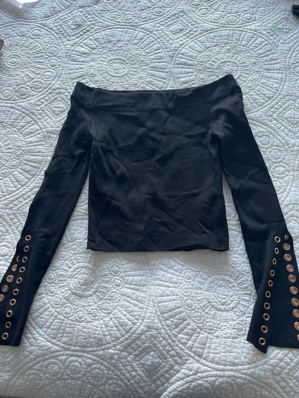 Black crop top with flared sleeves