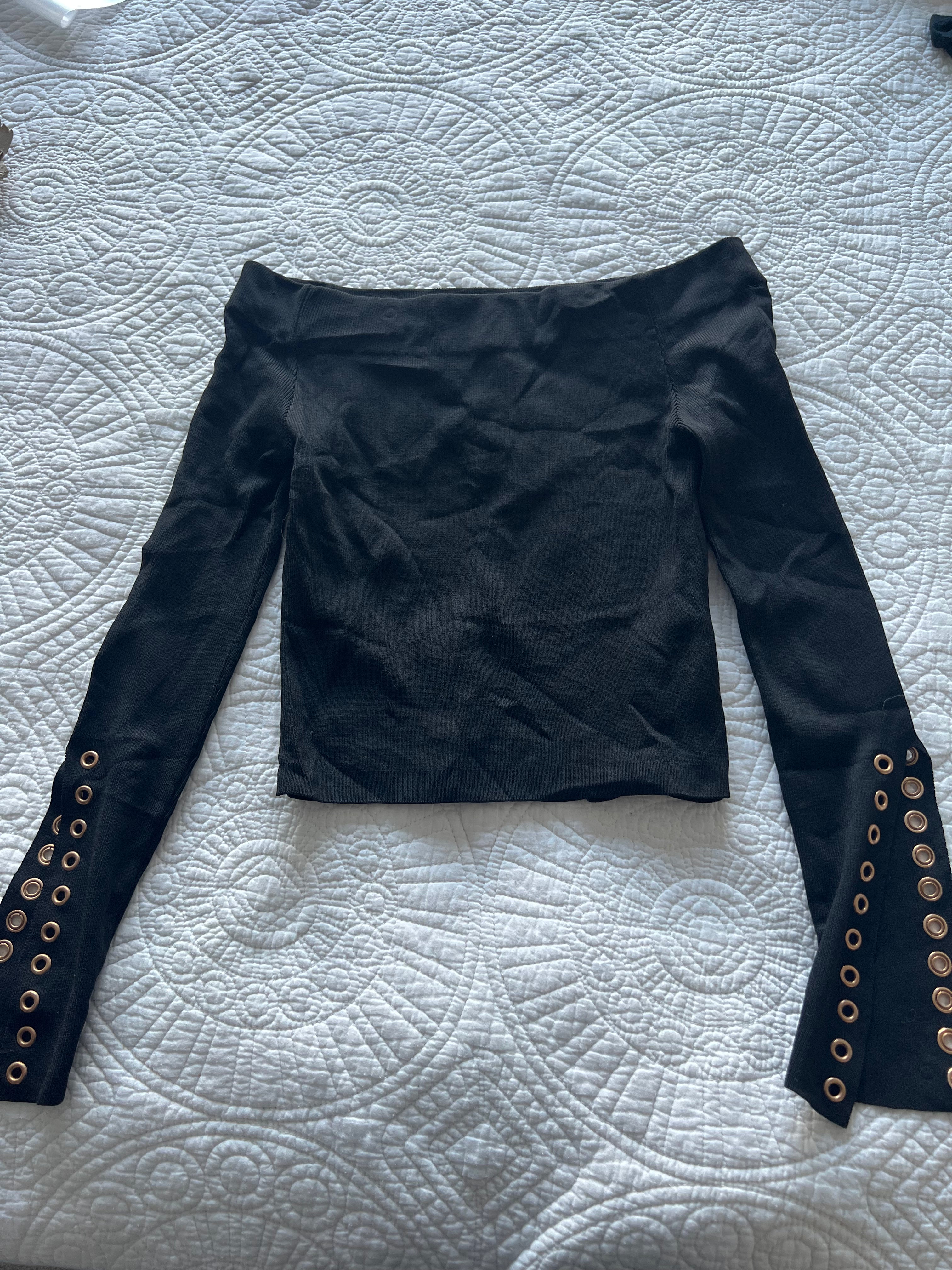Black crop top with flared sleeves