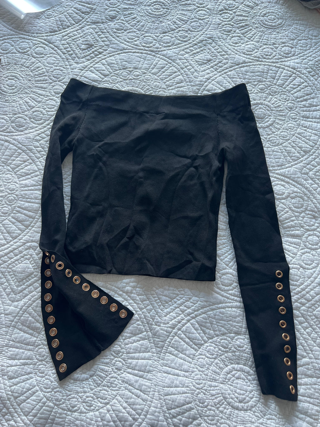 Black crop top with flared sleeves