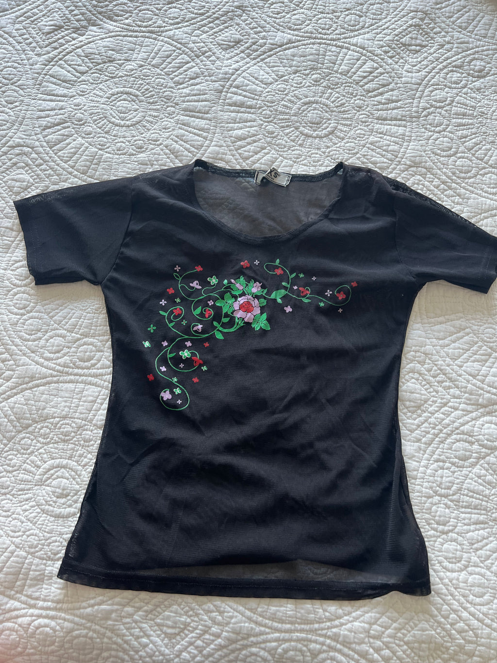 Black top with flower embroidery
