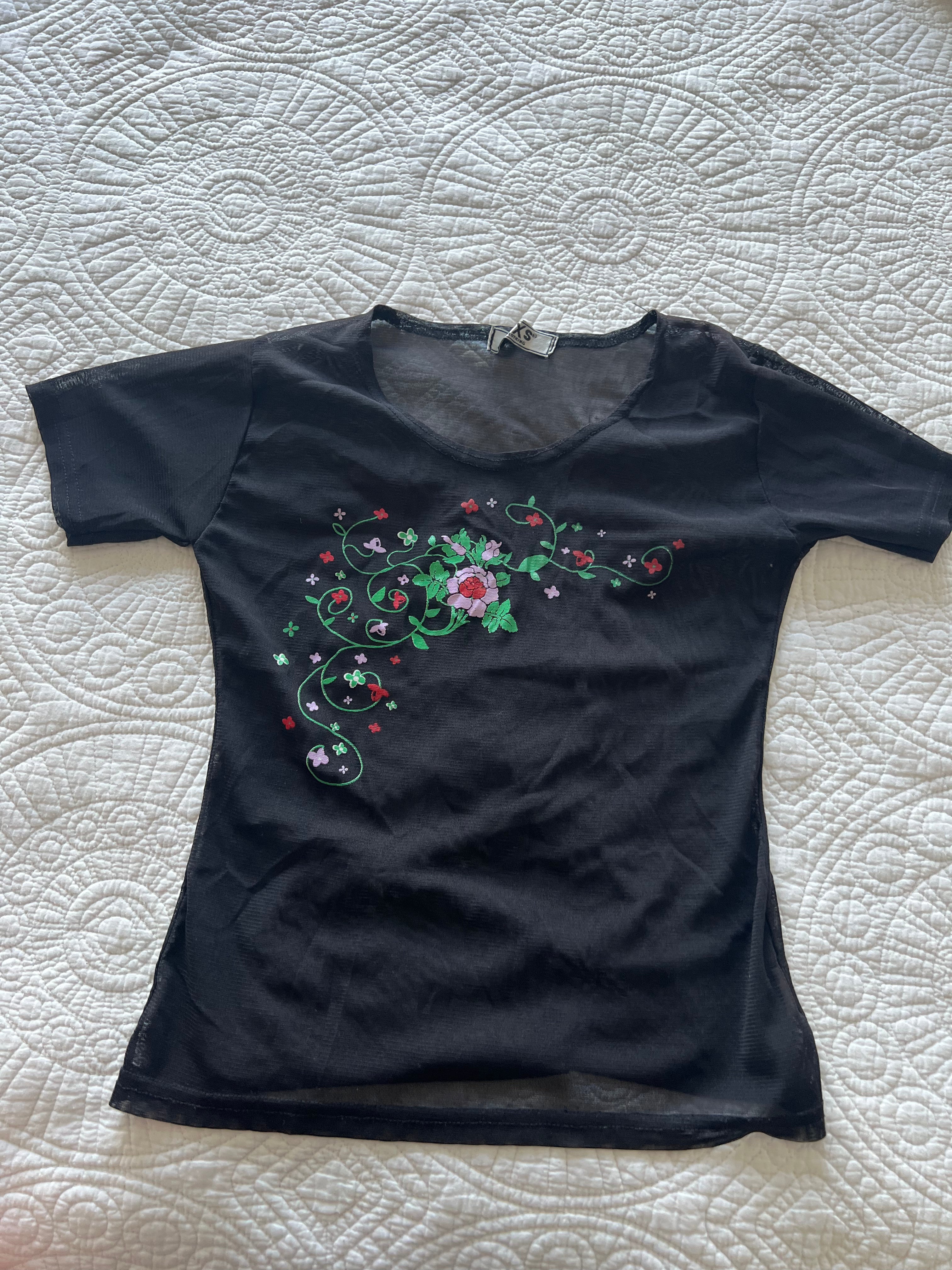 Black top with flower embroidery
