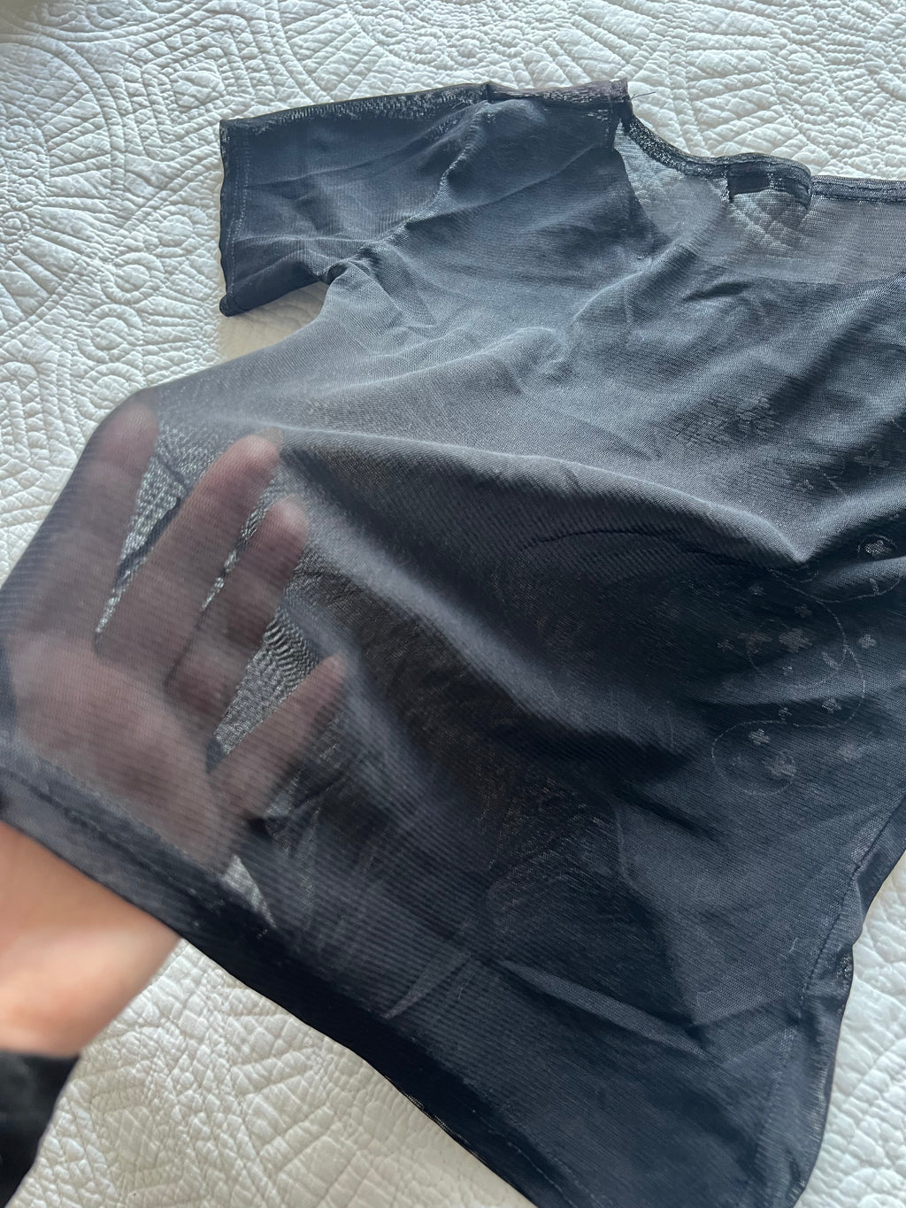 Black top with flower embroidery