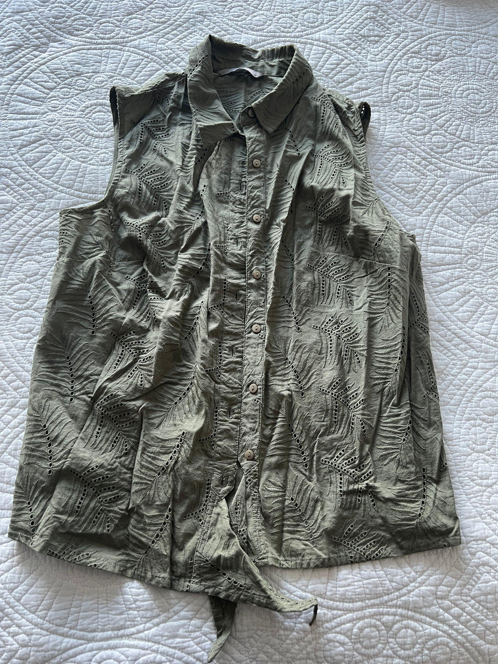 Green sleeveless shirt