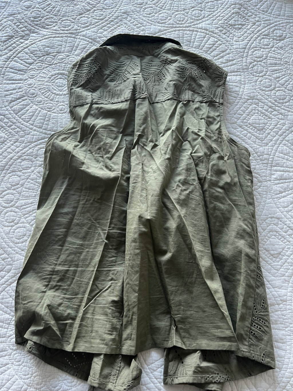 Green sleeveless shirt