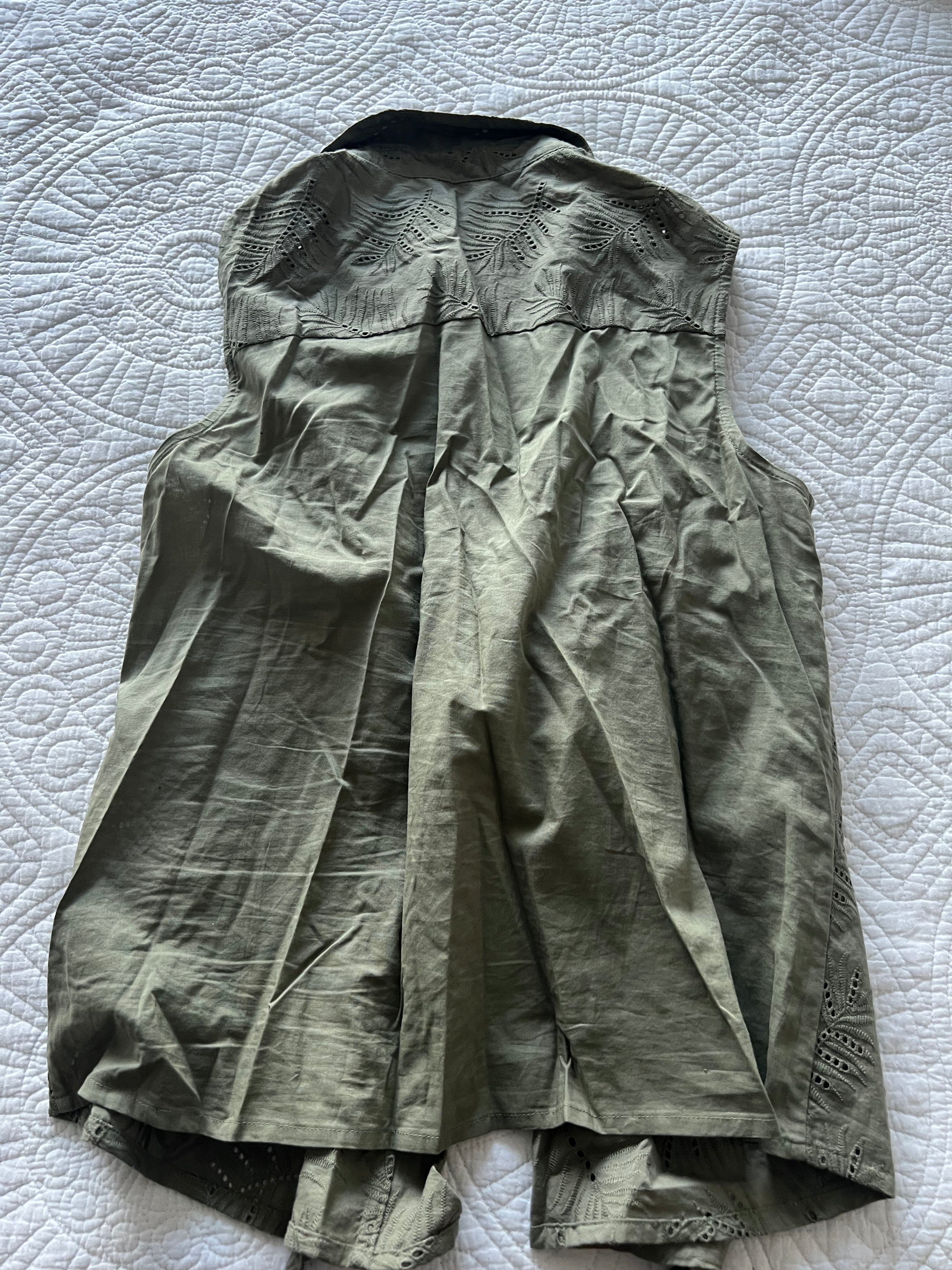 Green sleeveless shirt