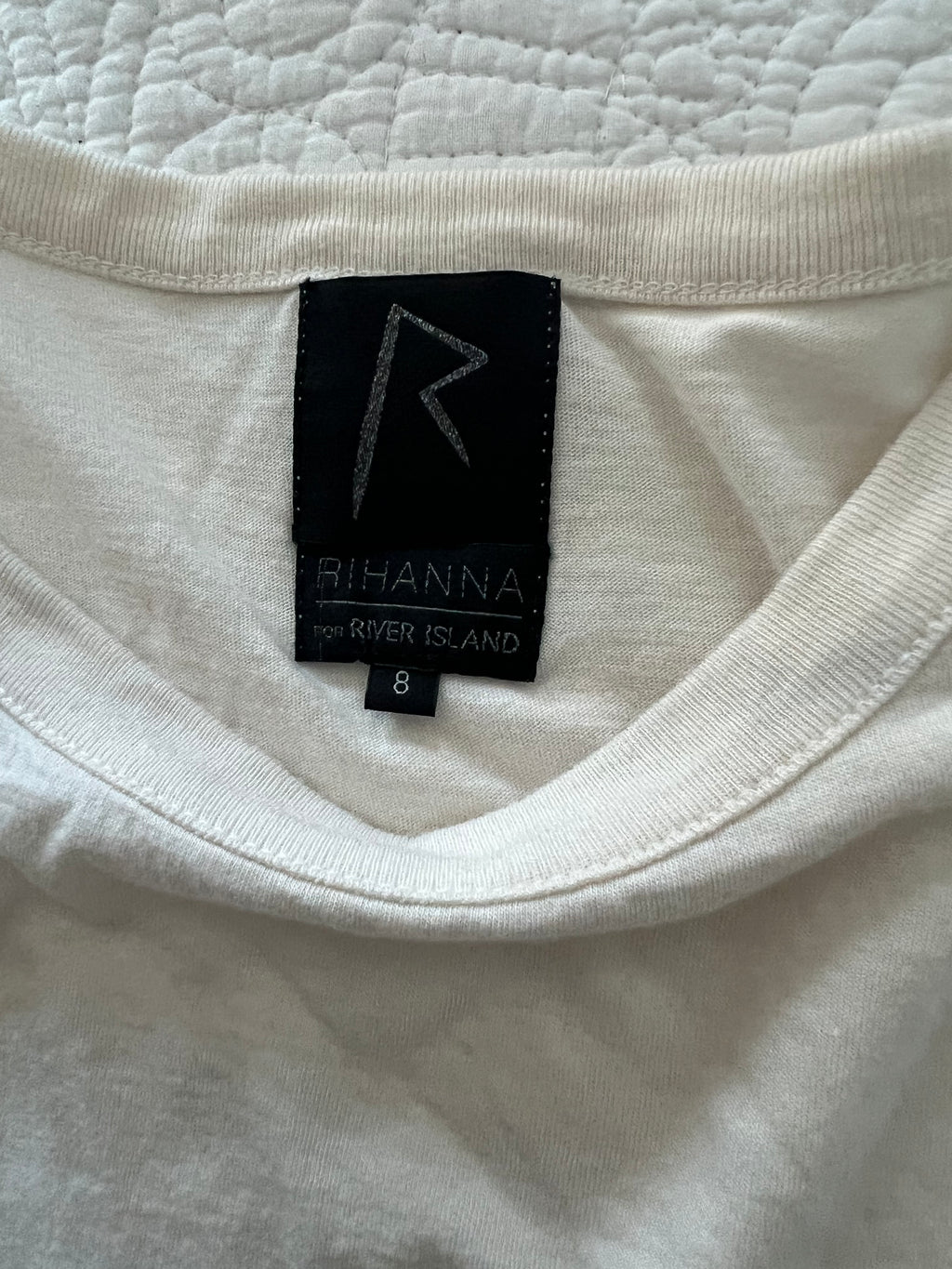 White vest top