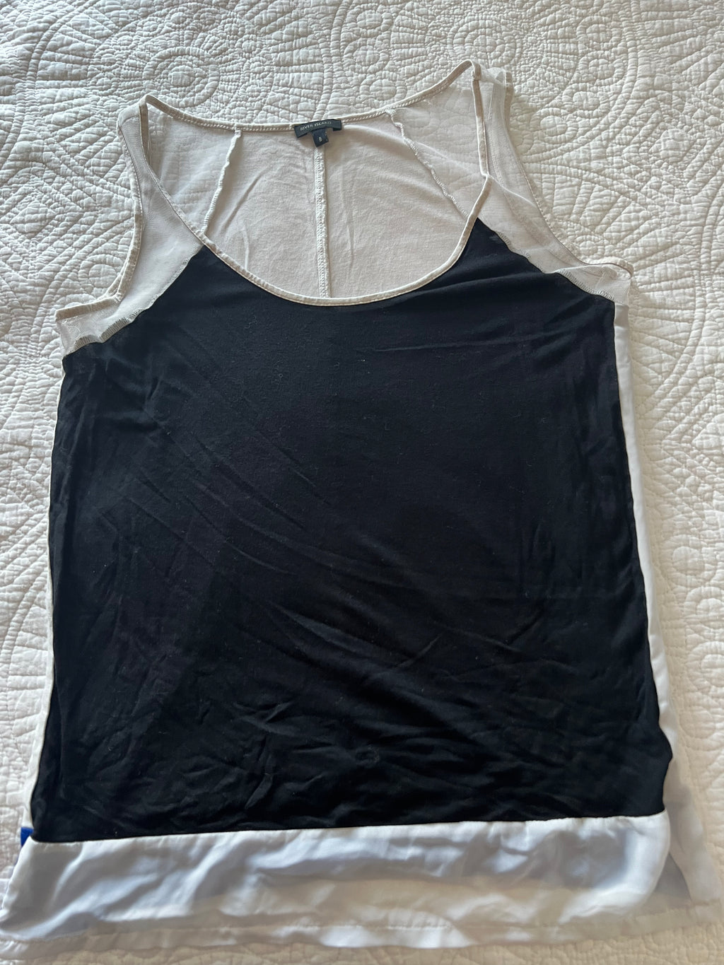 Black & white vest