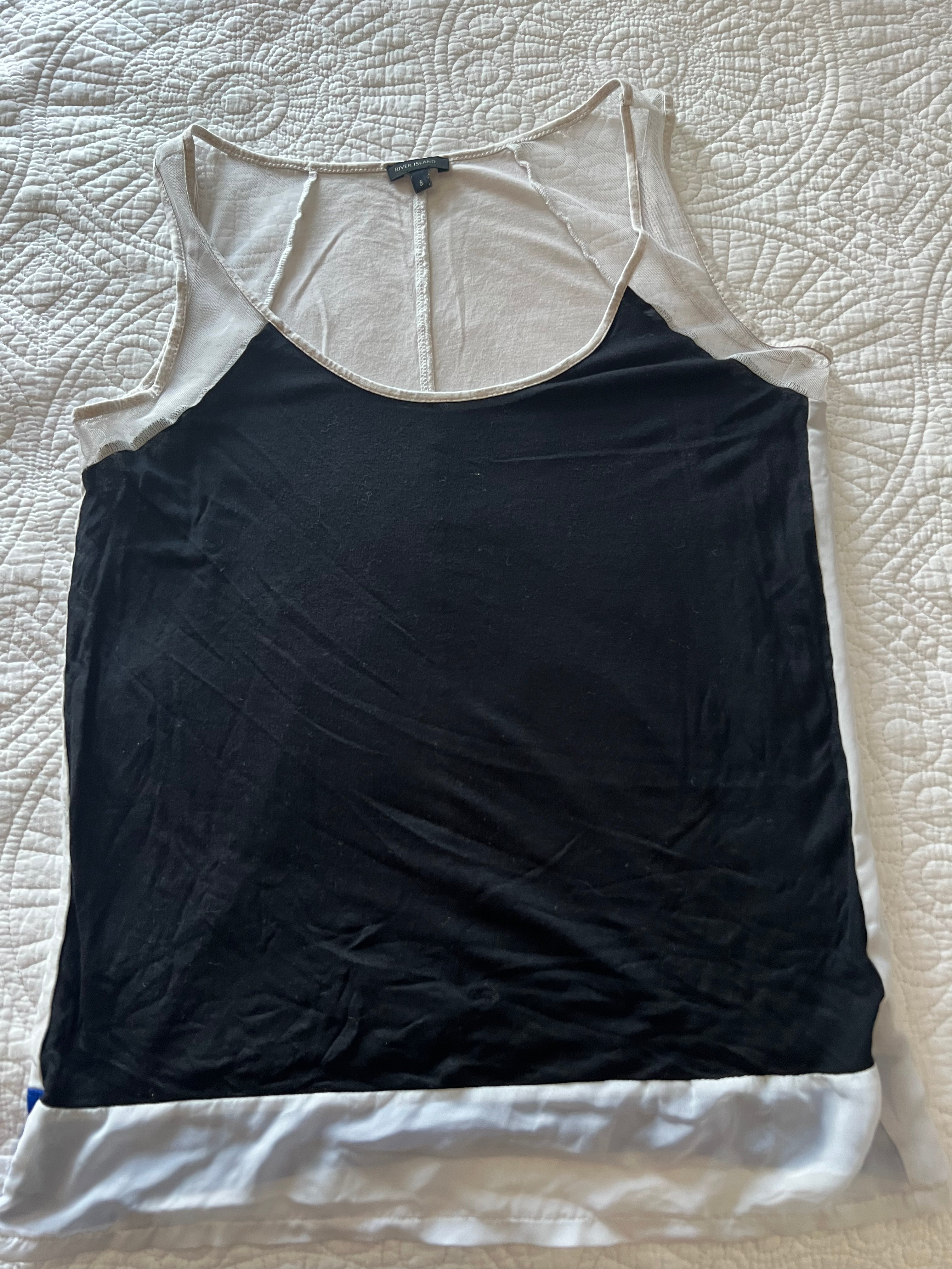 Black & white vest