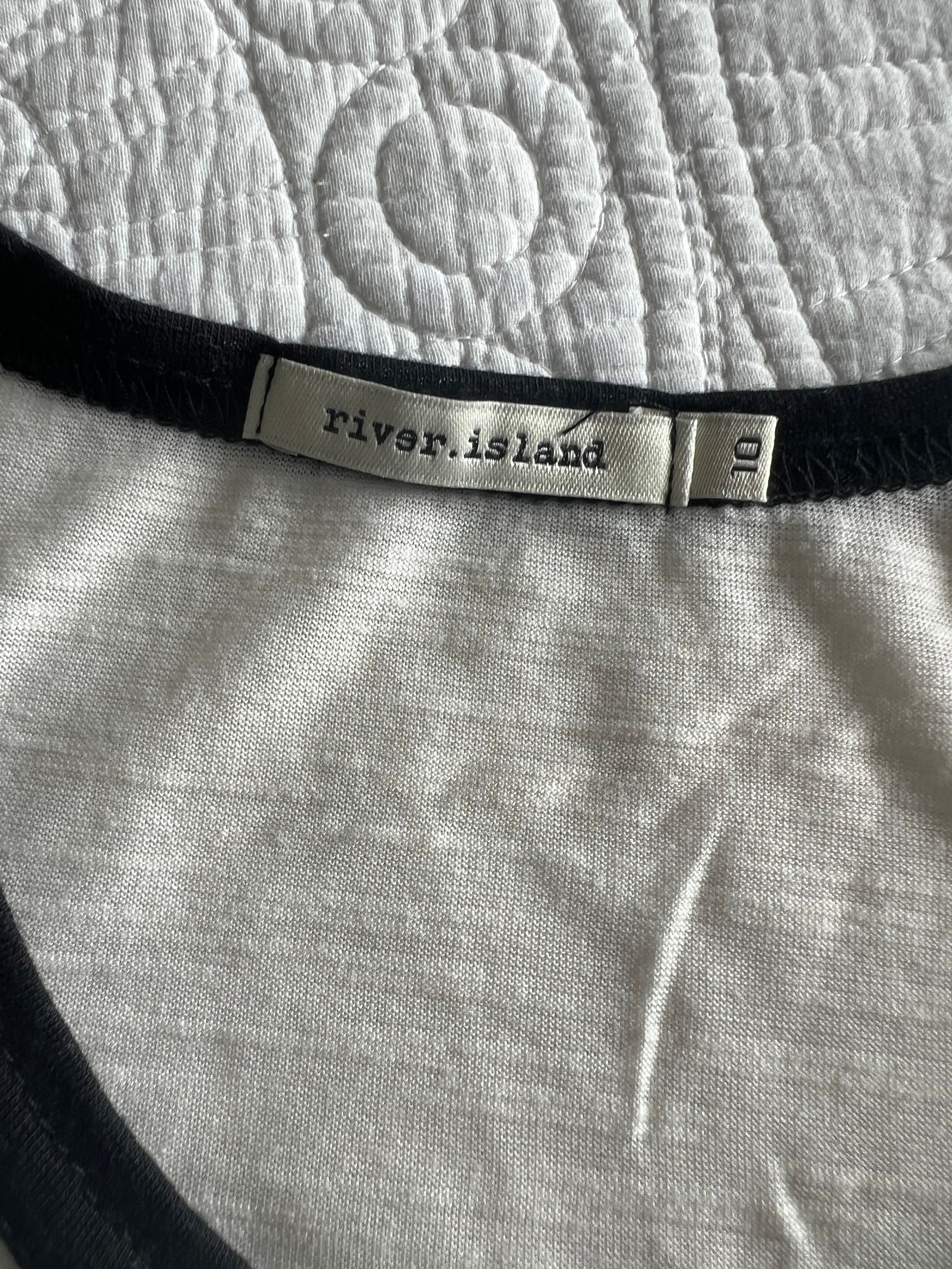 White graphic vest