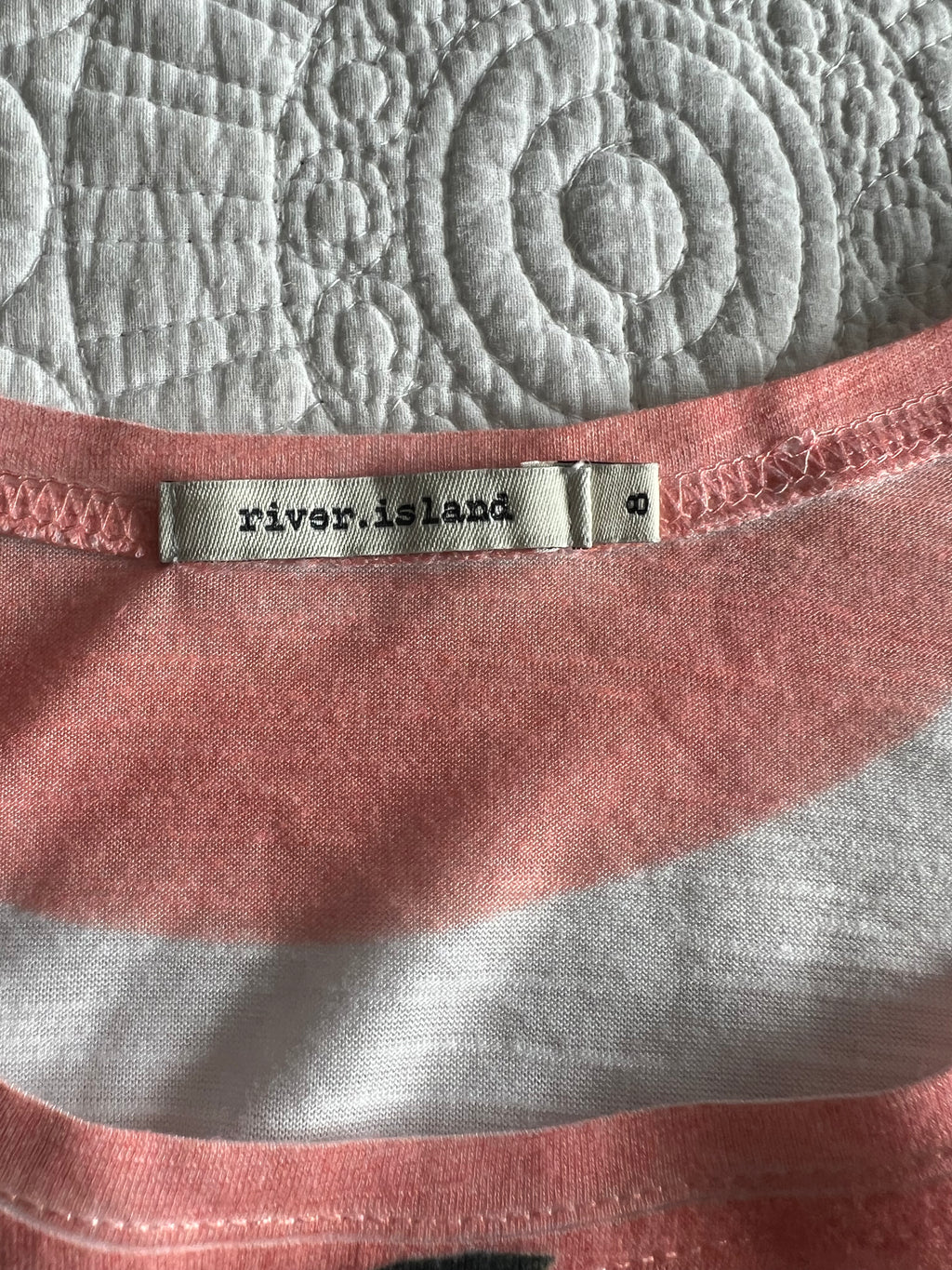 White graphic vest