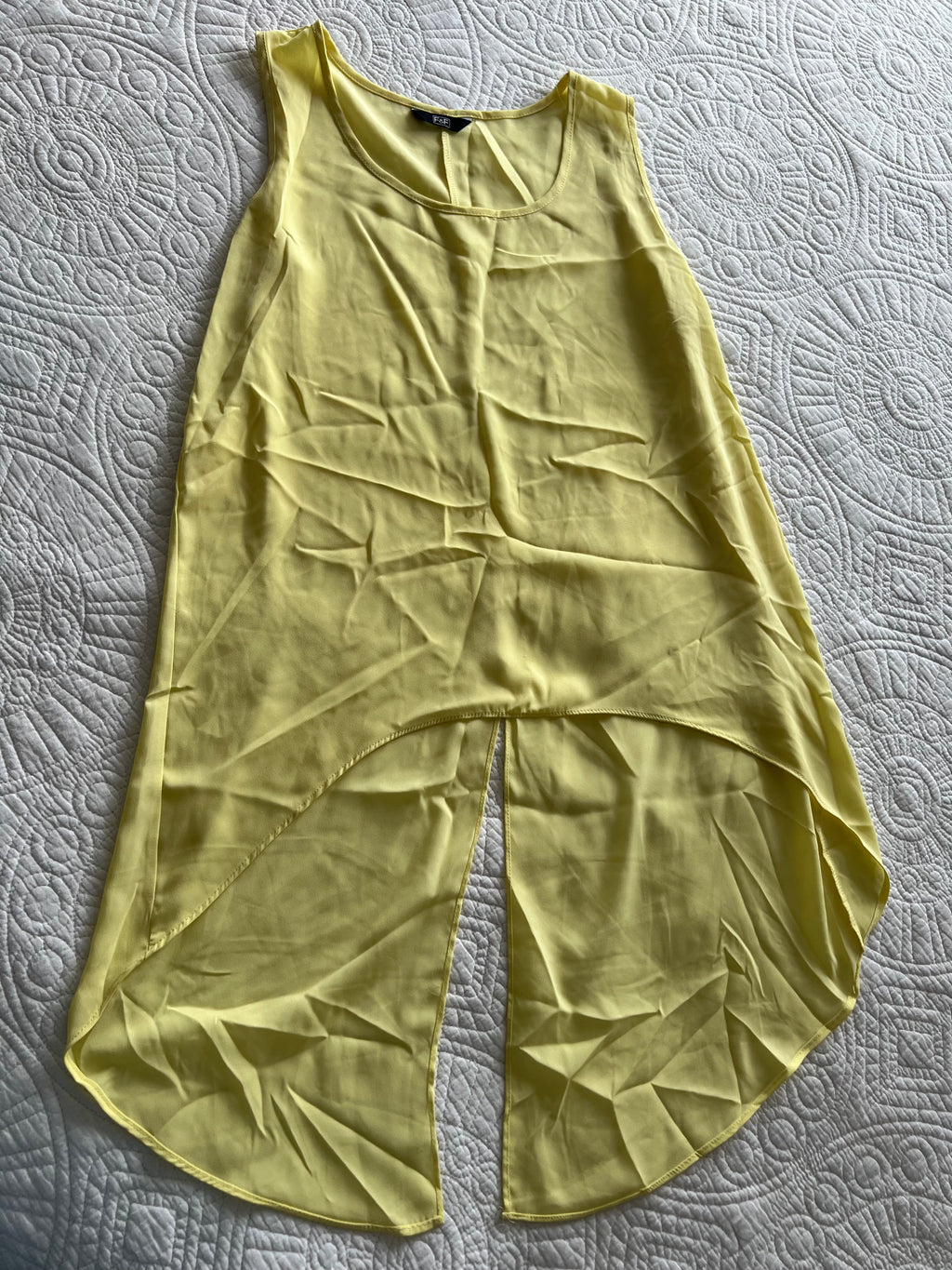 Yellow vest top with long cut out back