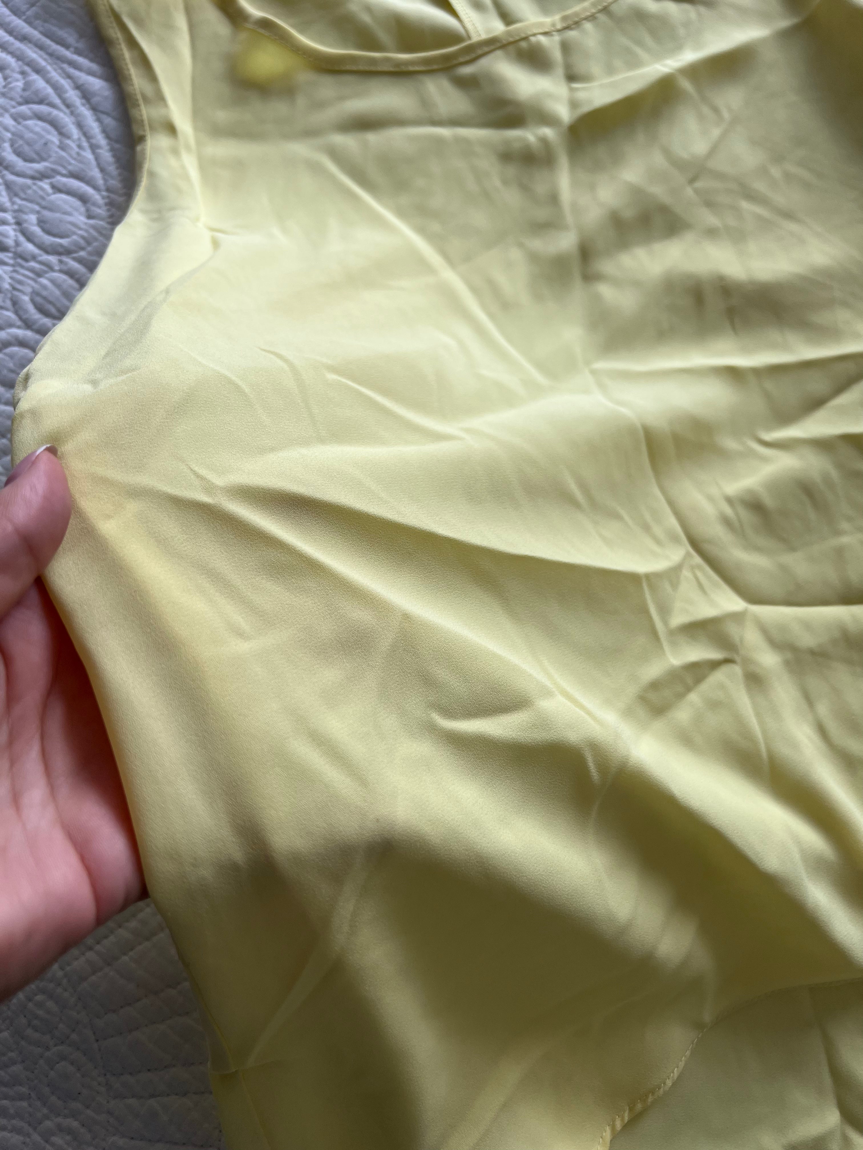 Yellow vest top with long cut out back