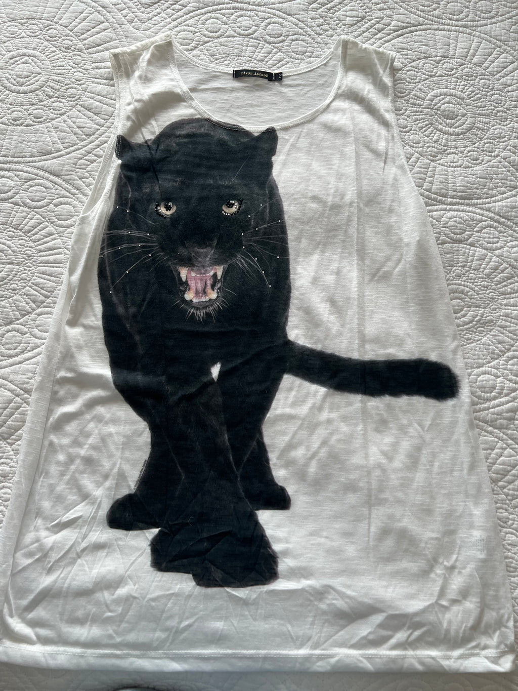 White graphic vest