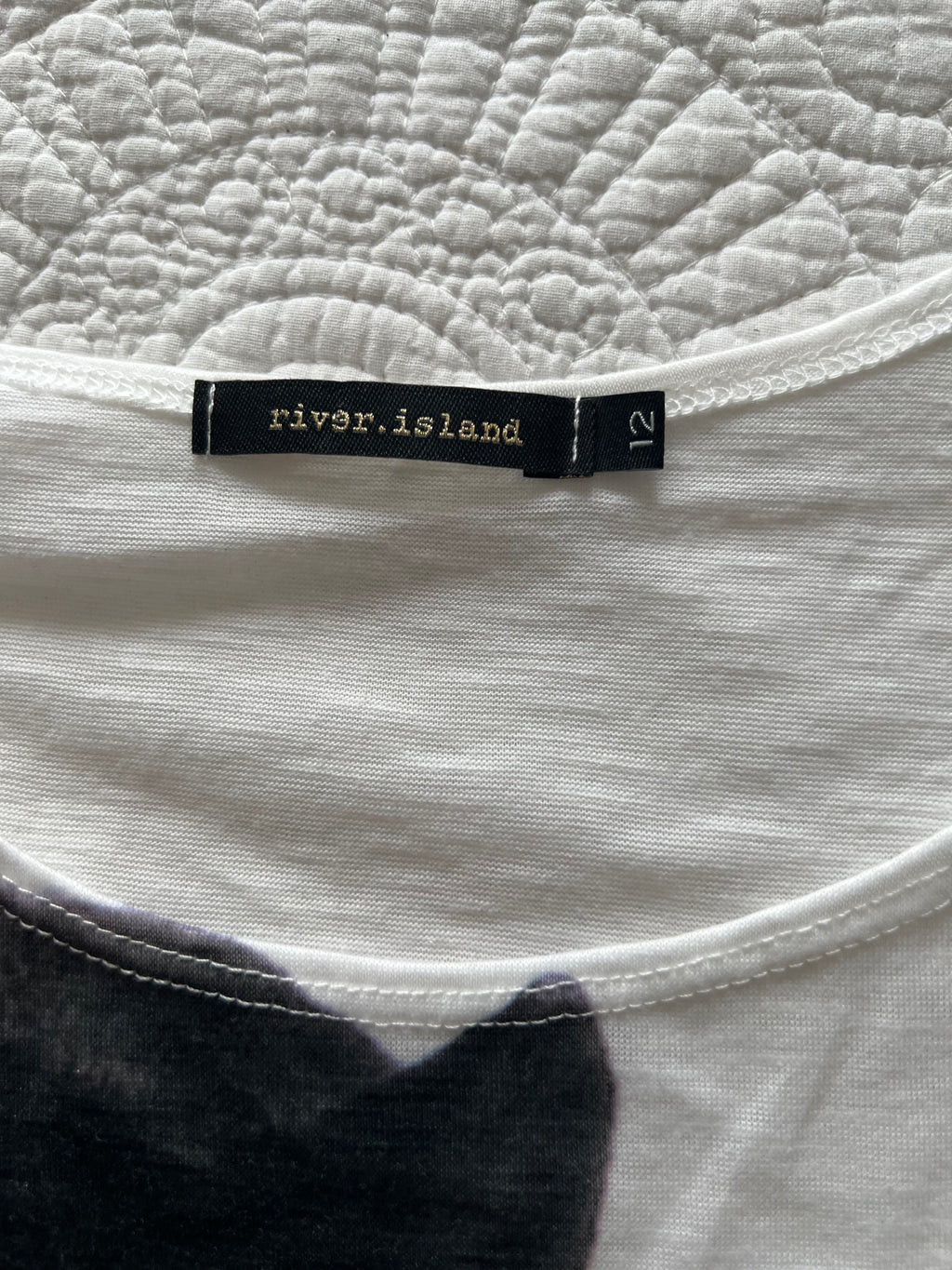 White graphic vest