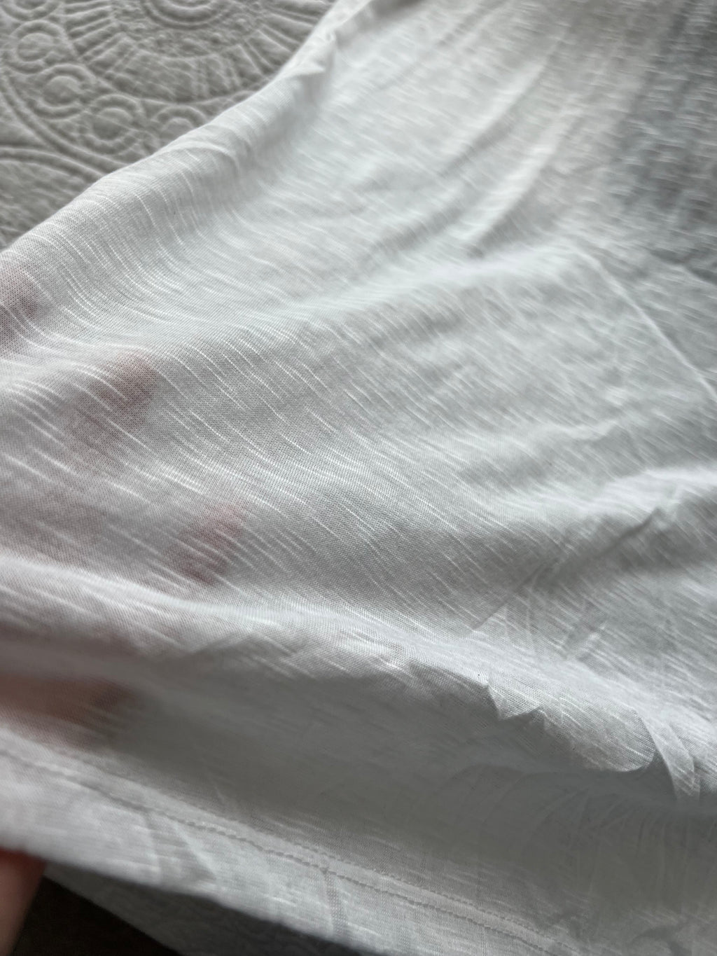 White graphic vest