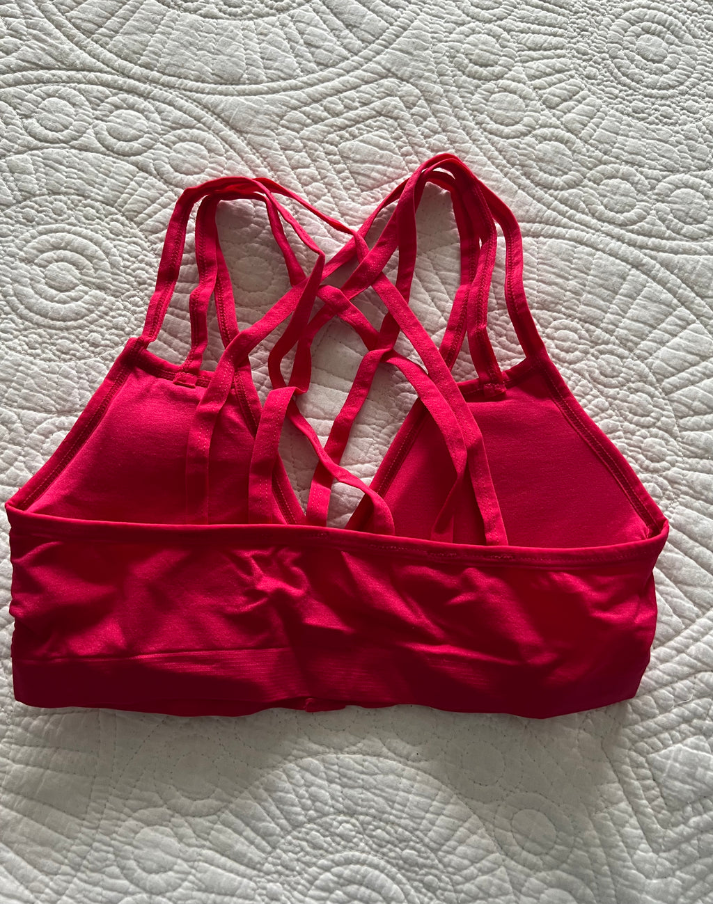Pink XOXO sports bra
