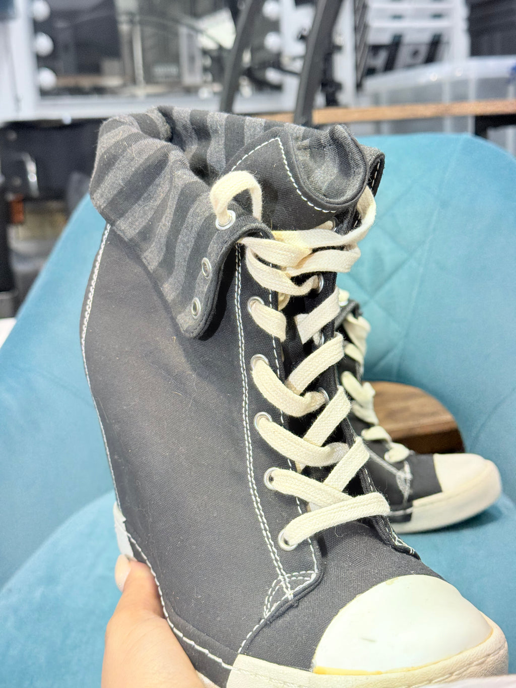 Black high top wedge lace up trainers