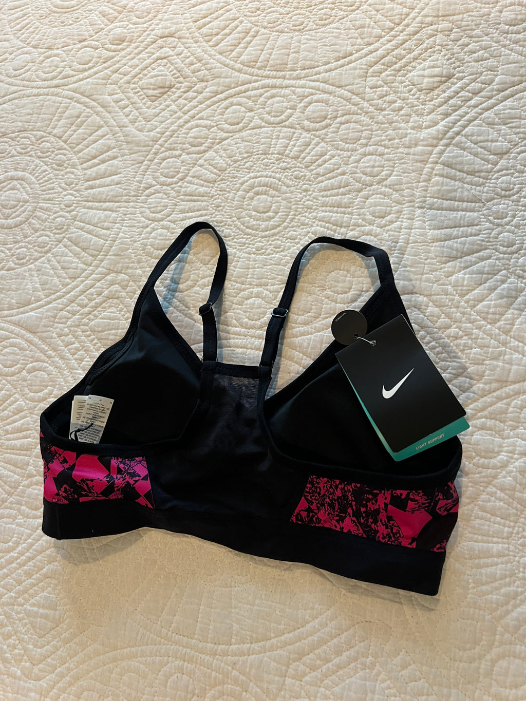 Black/pink Nike sports bra