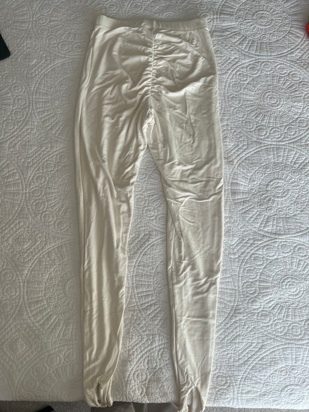 Cream stirrup loop leggings