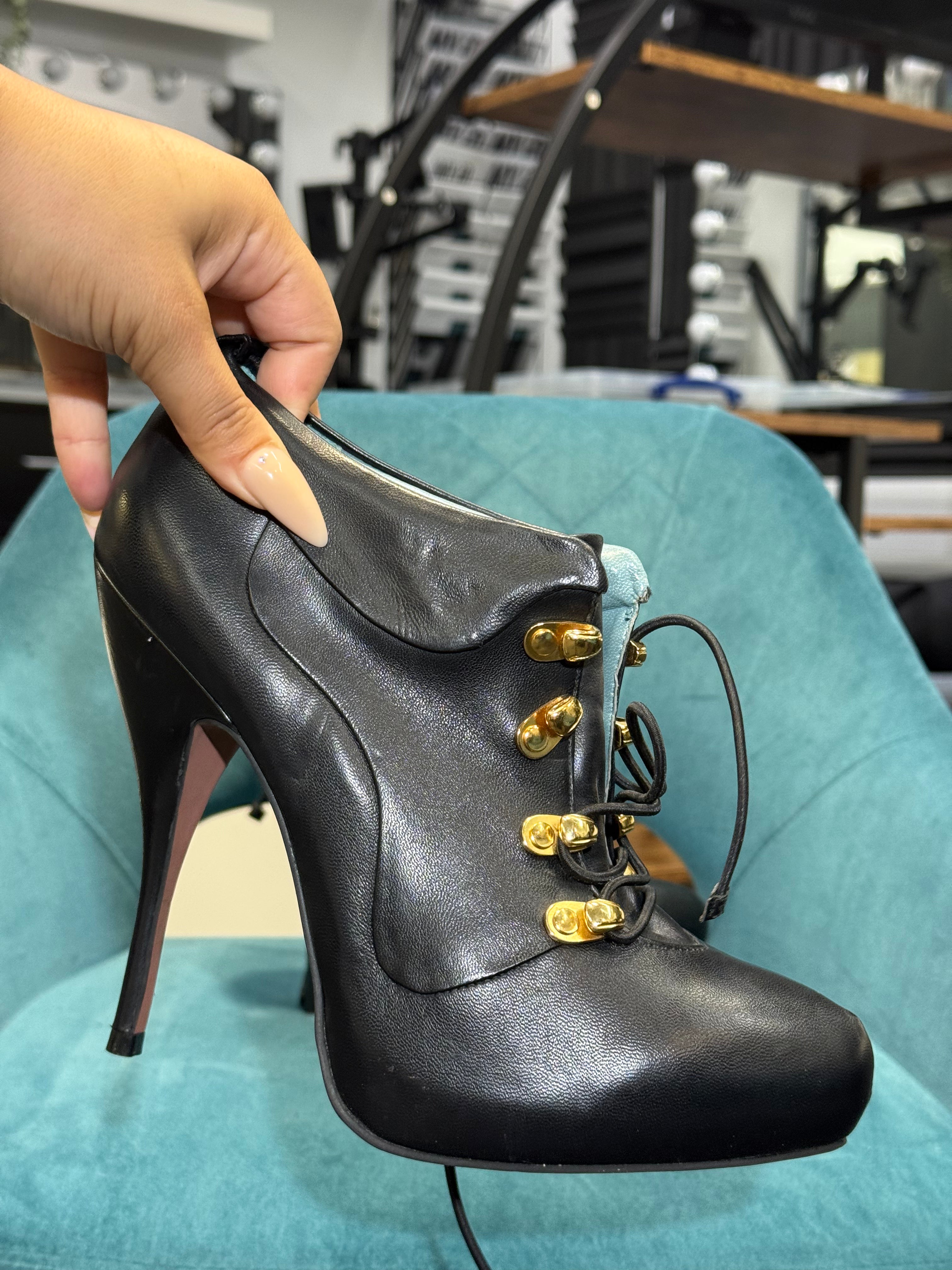 Black Leather Lace-Up Stiletto Ankle Boots with Gold Hardware