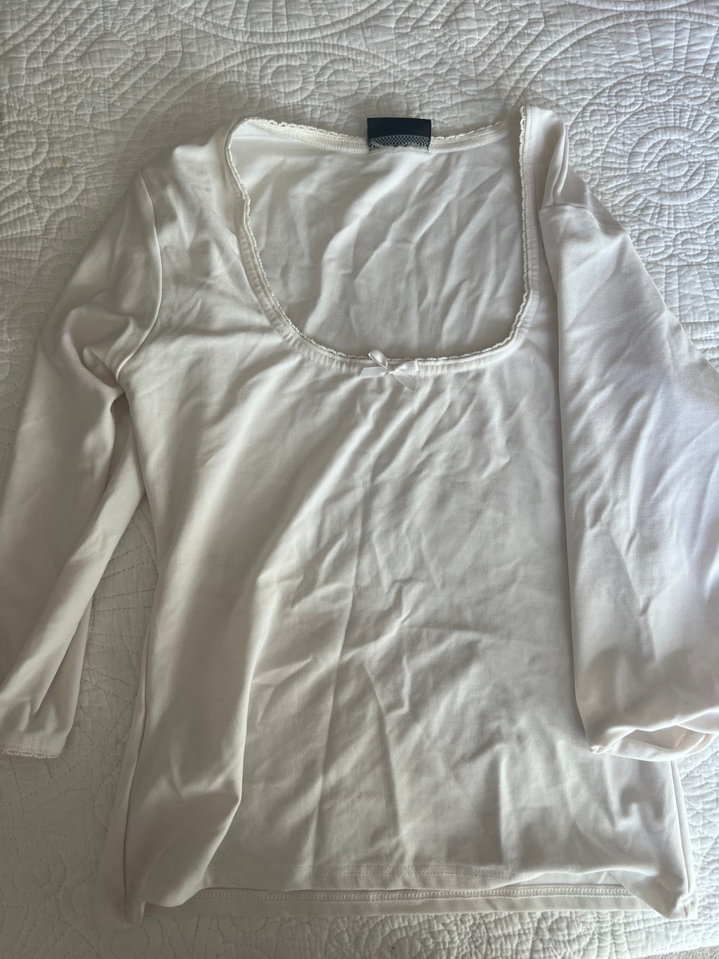 White quarter sleeve top