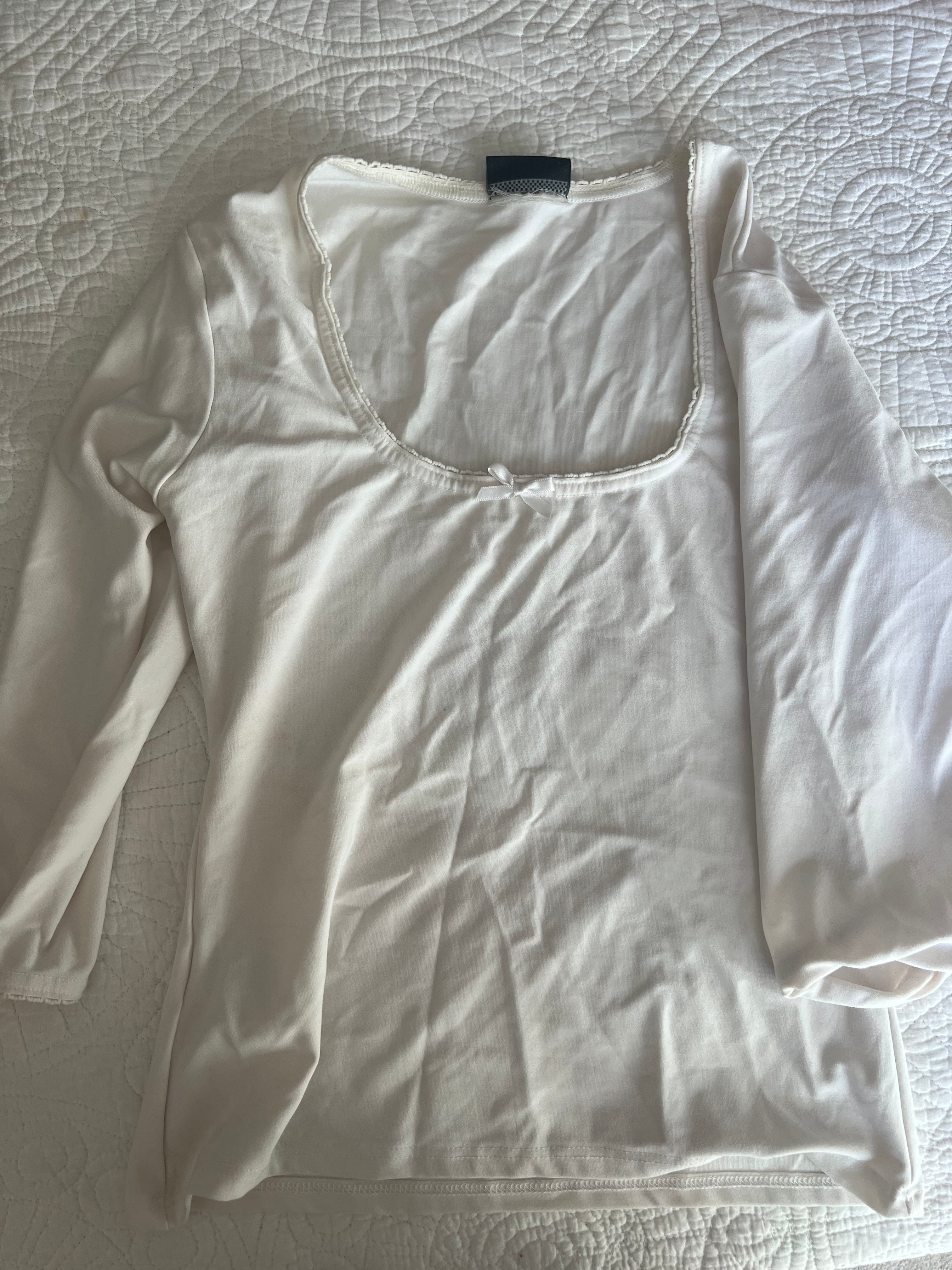 White quarter sleeve top