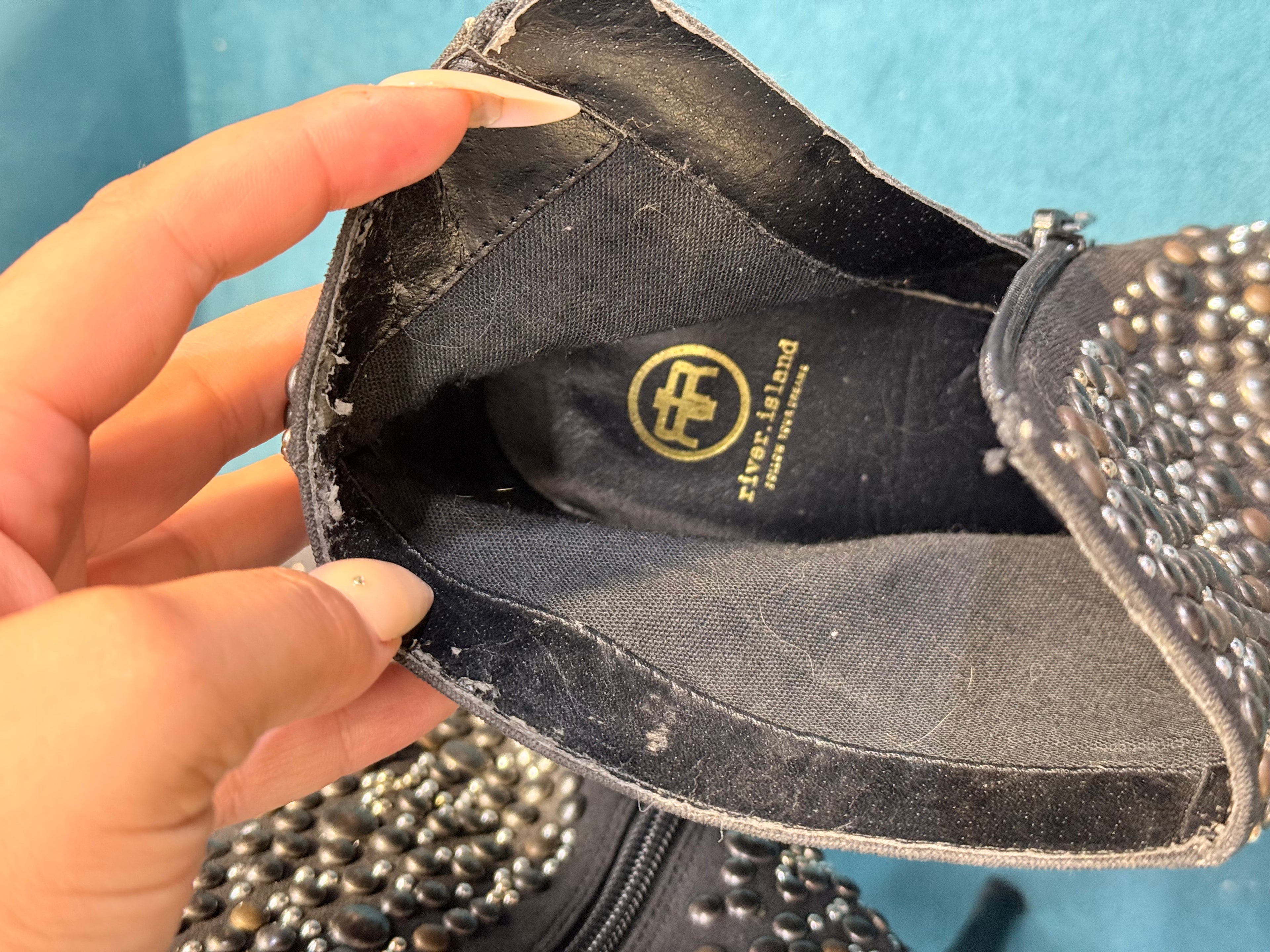 Black ankle heels with silver embellishments