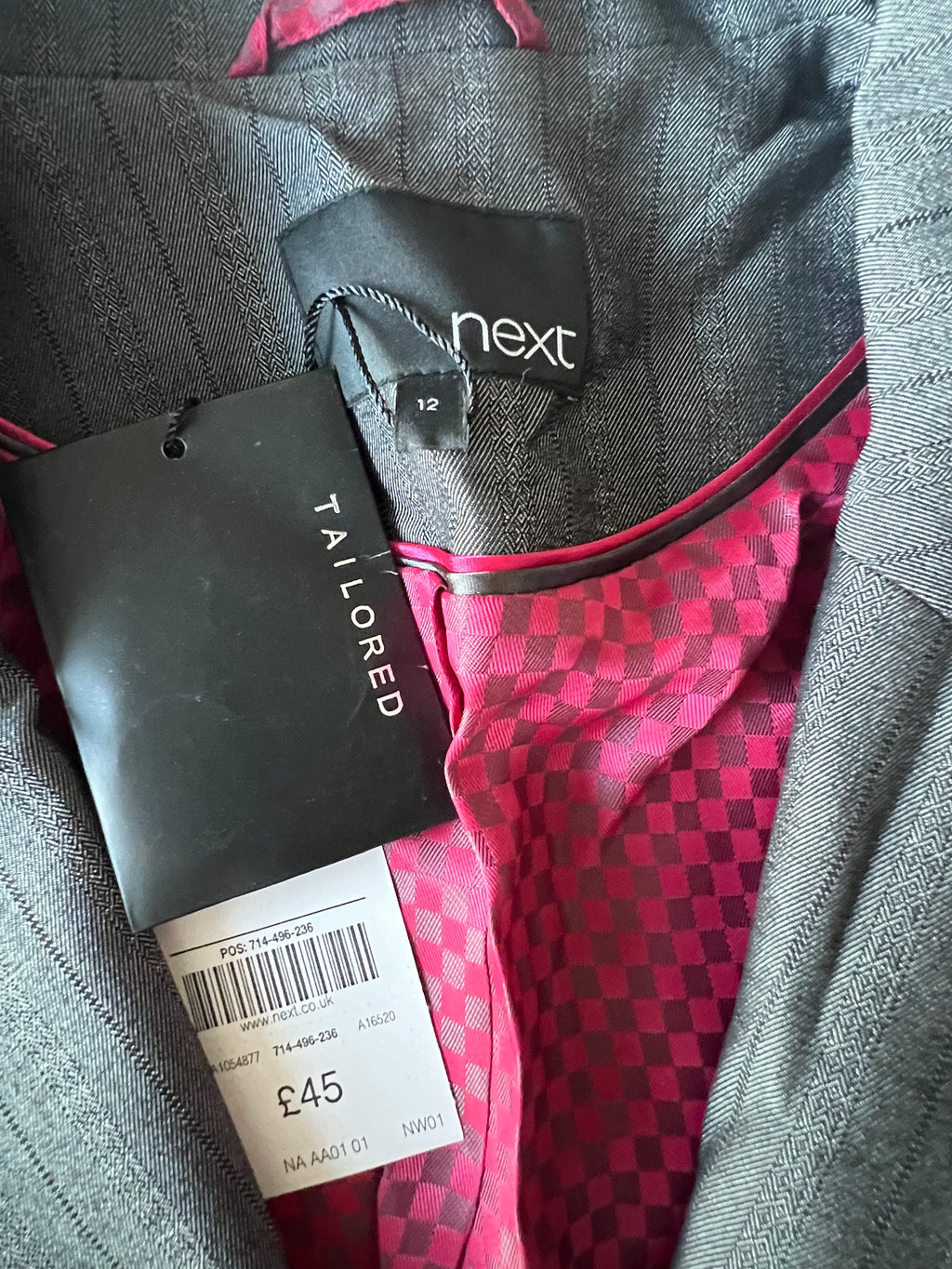 Low waisted grey trousers with matching blazer