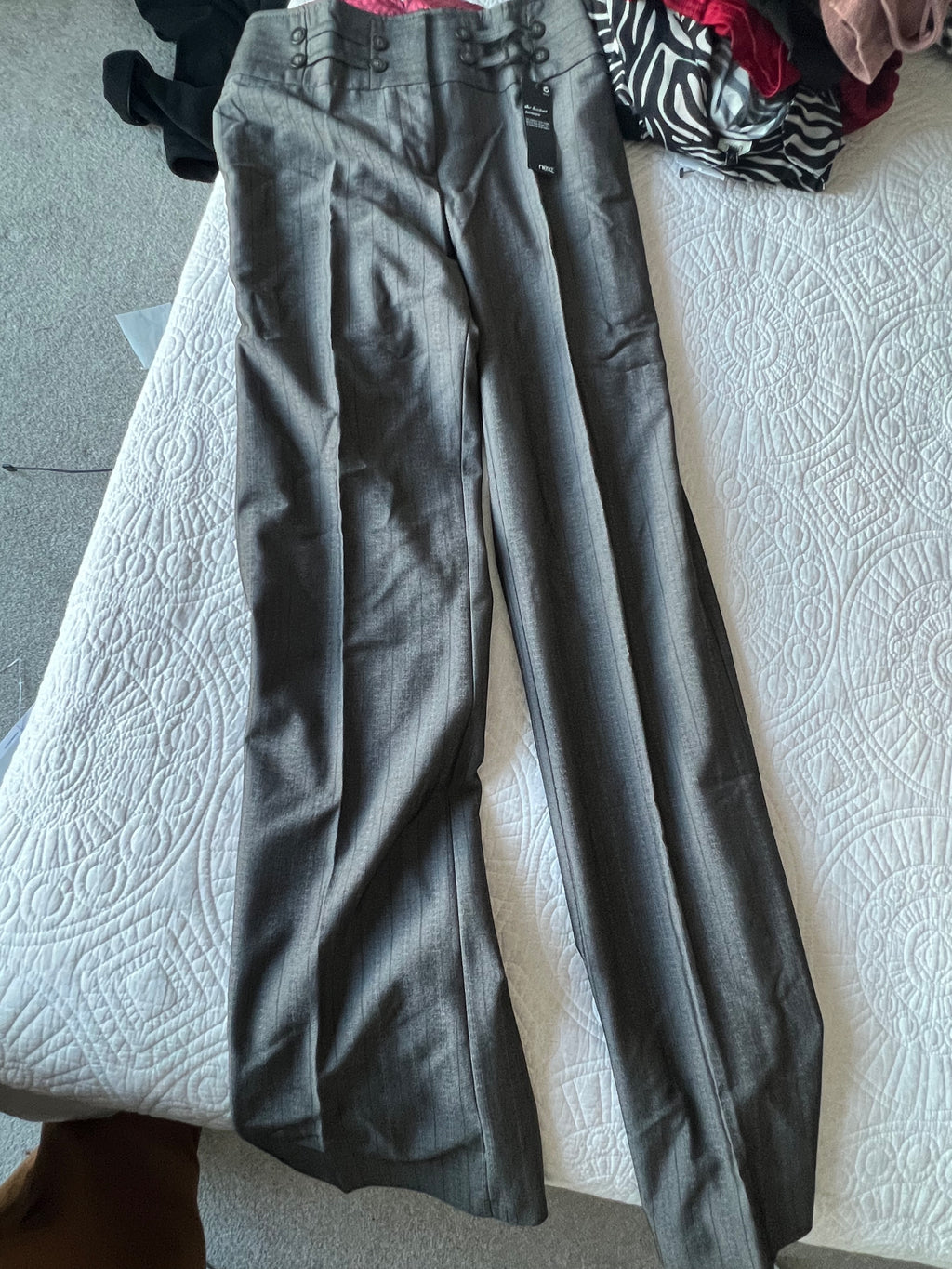 Low waisted grey trousers with matching blazer