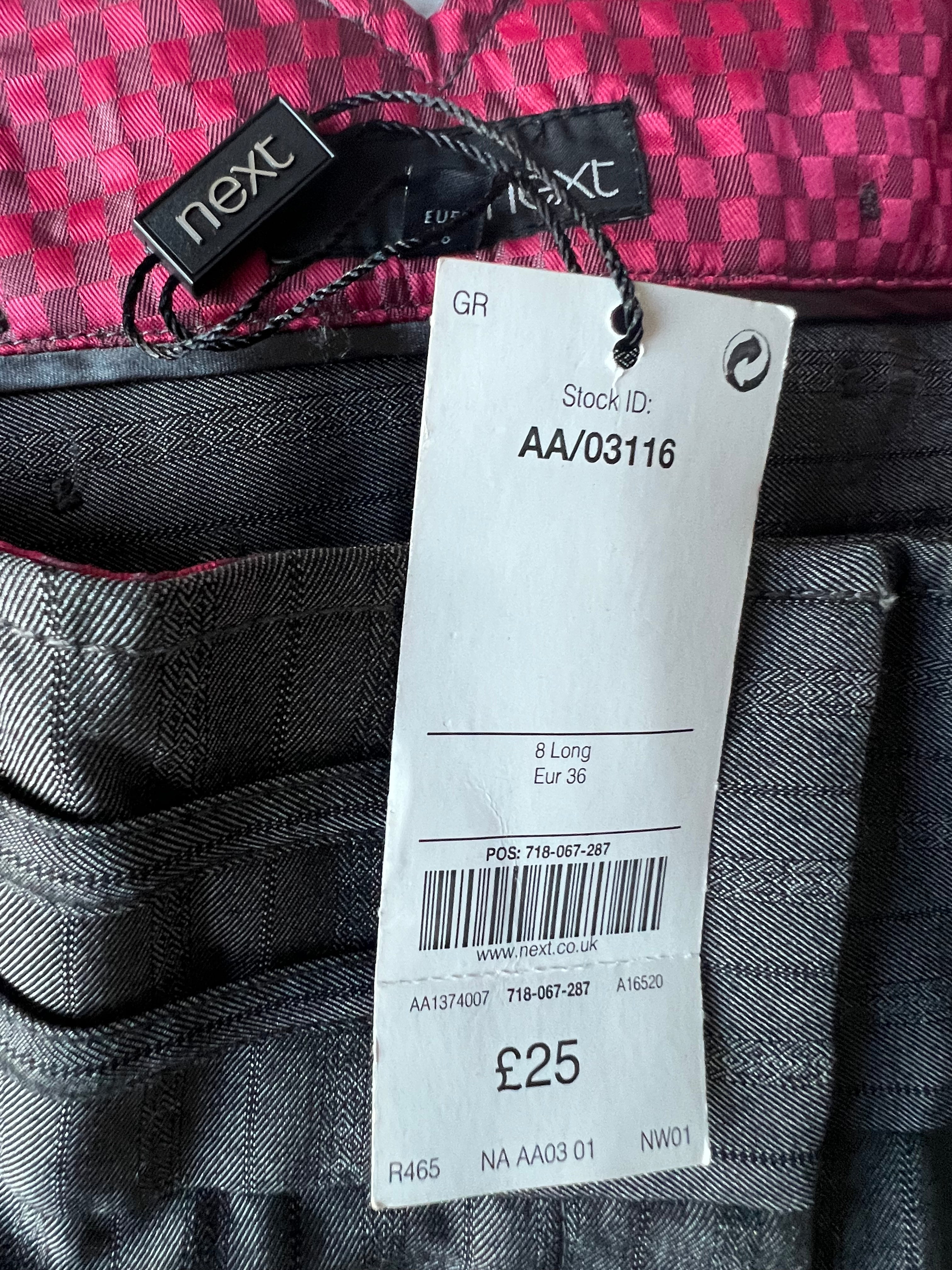 Low waisted grey trousers with matching blazer