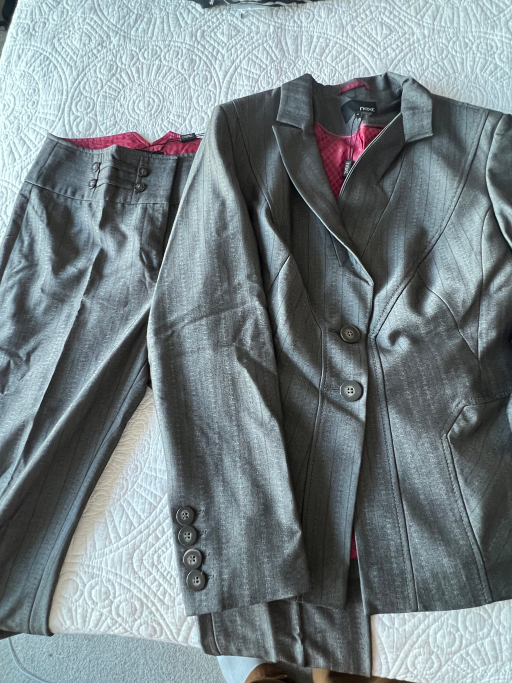 Low waisted grey trousers with matching blazer