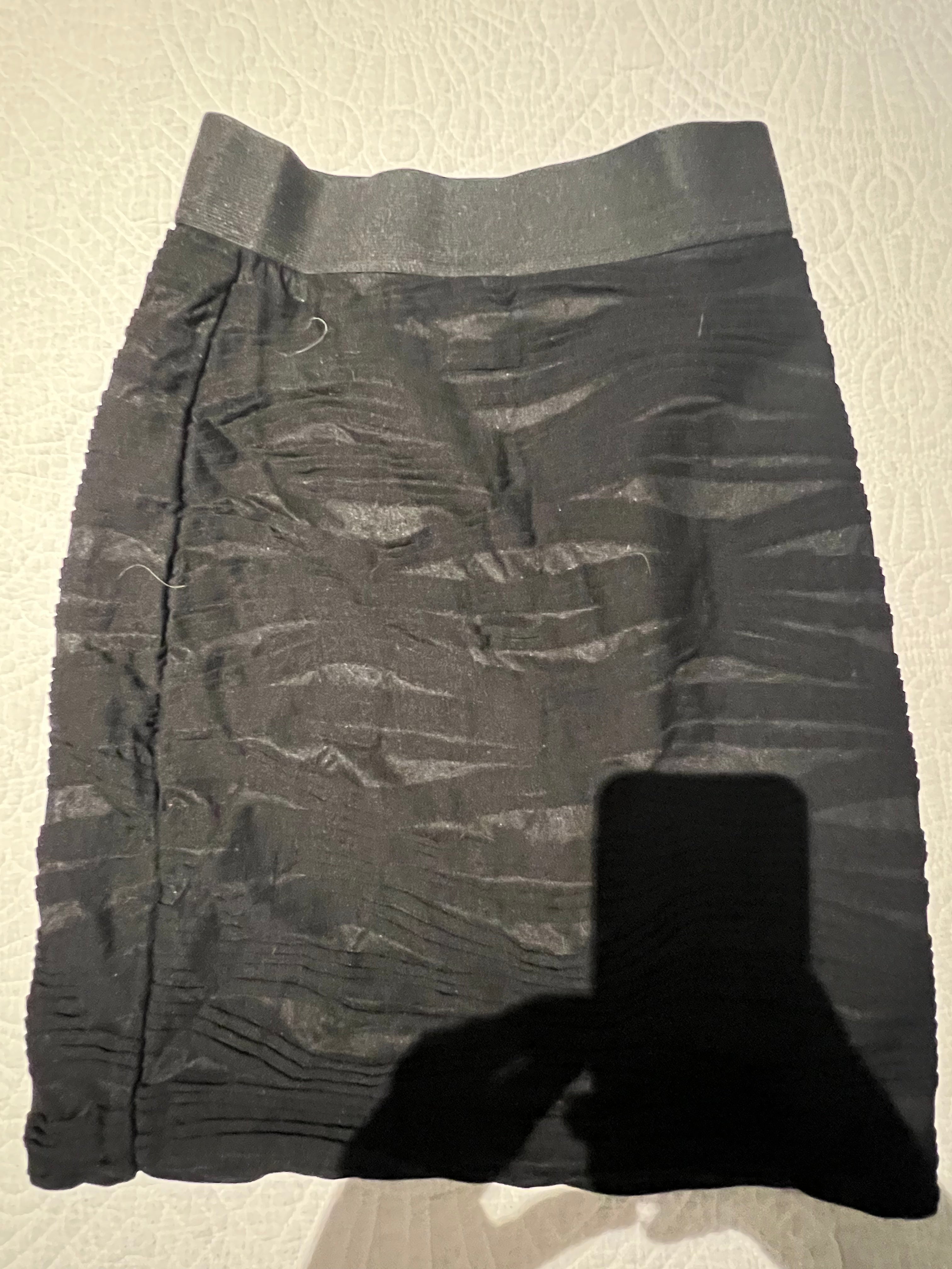 Black textured mini skirt