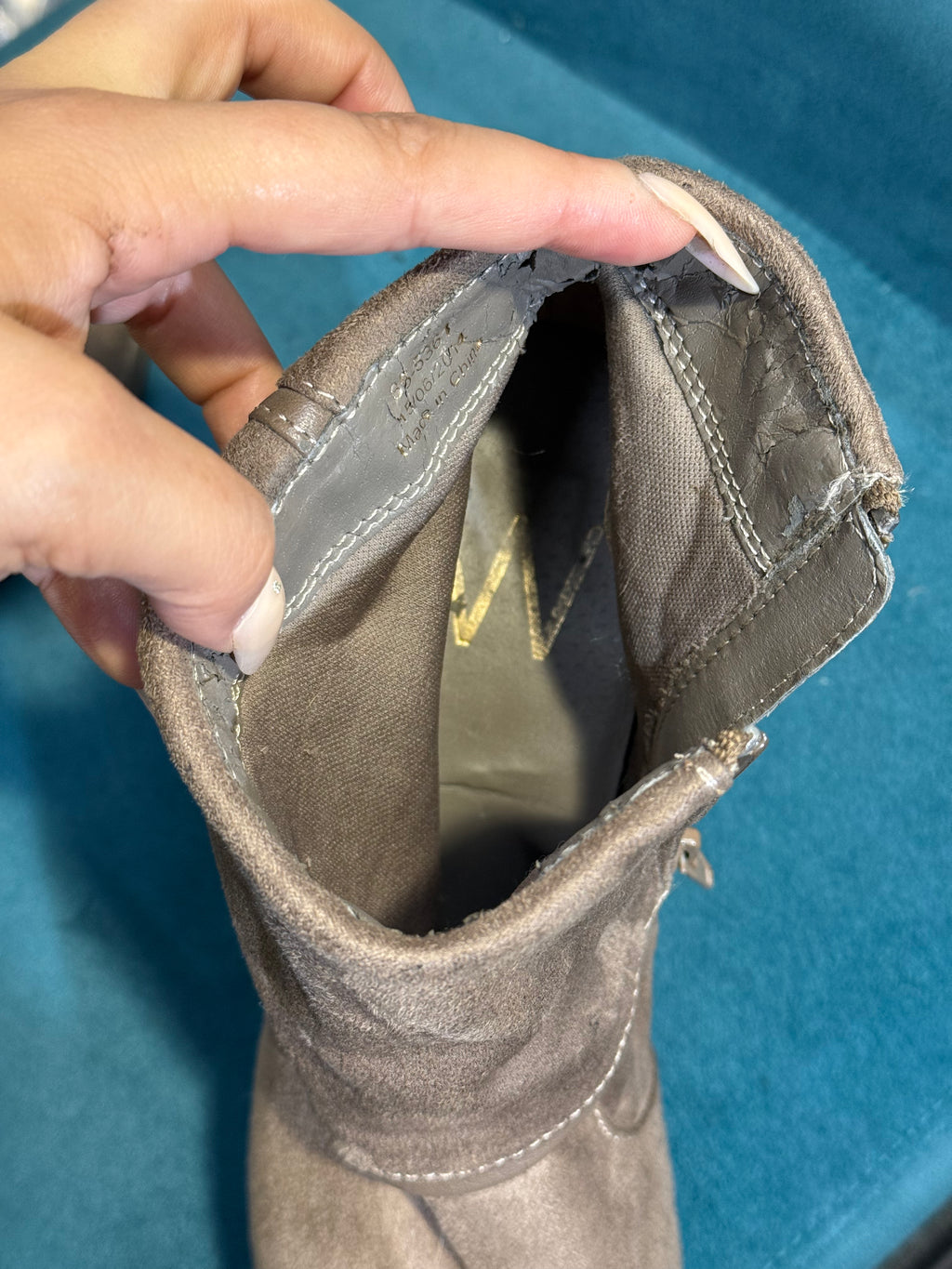 Women’s taupe heeled ankle boots with zip detail