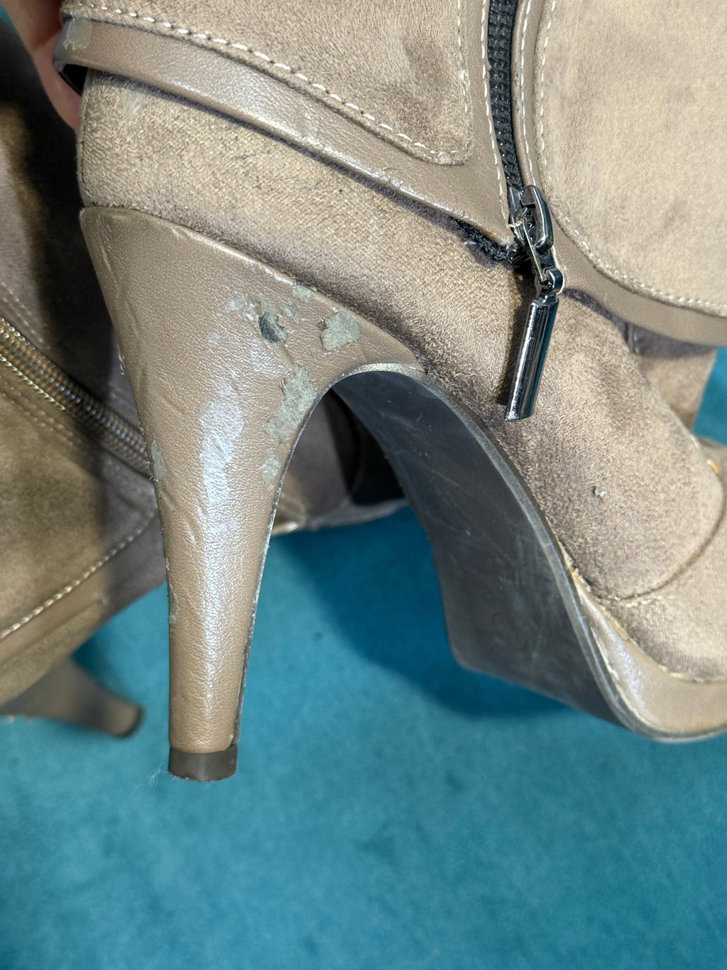 Women’s taupe heeled ankle boots with zip detail