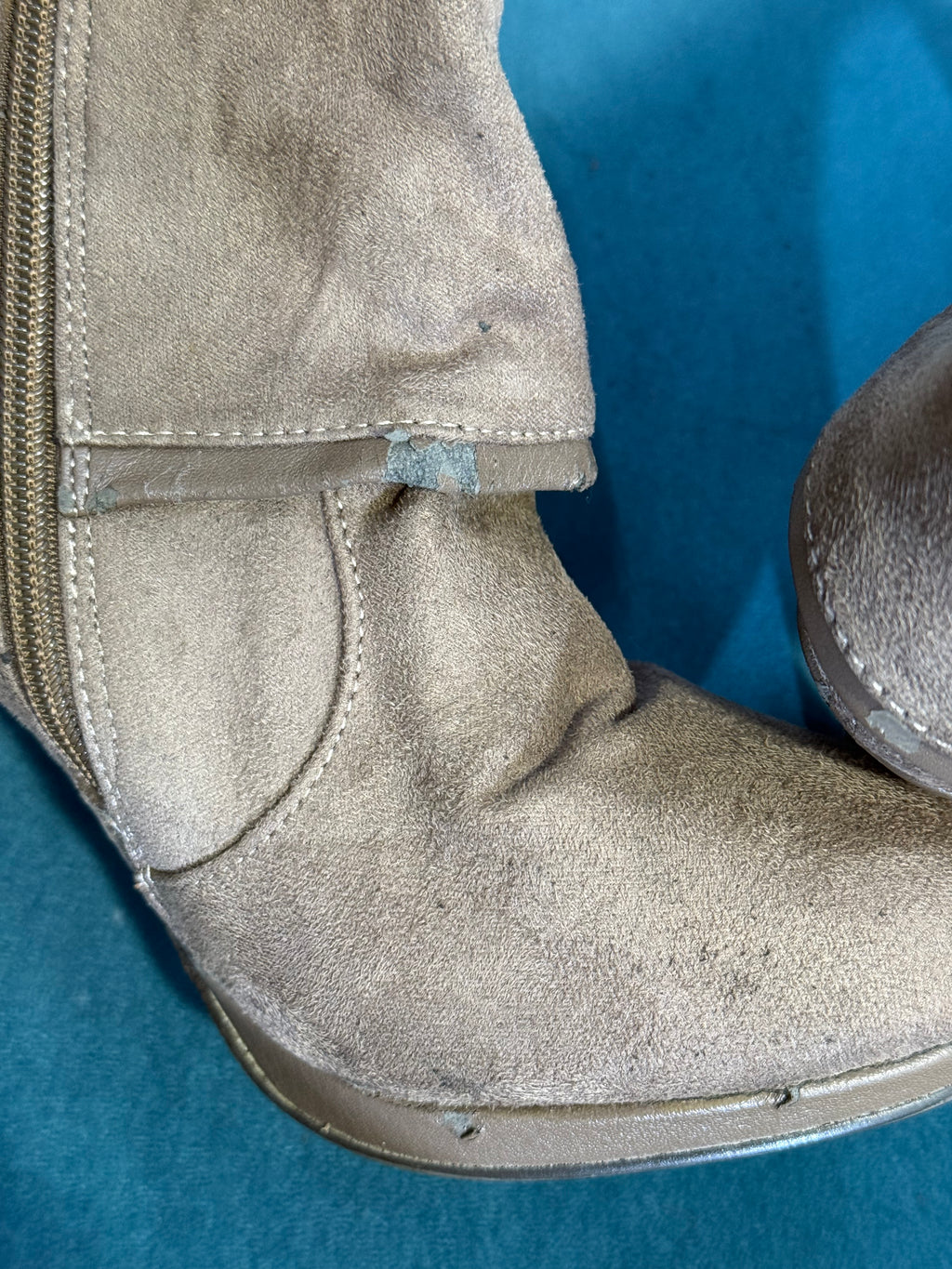 Women’s taupe heeled ankle boots with zip detail