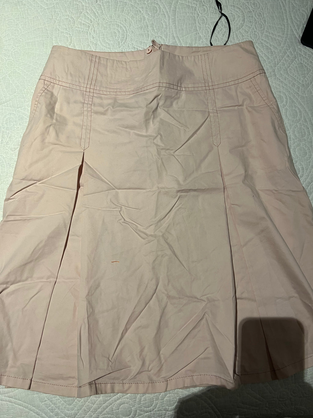 Pale pink mini skirt