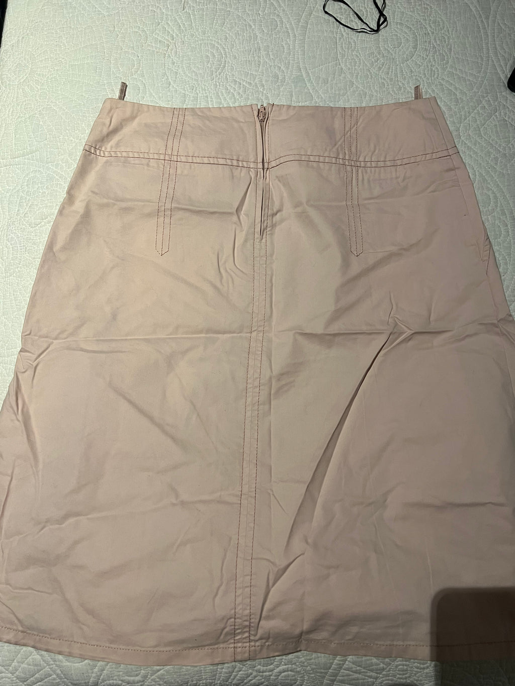 Pale pink mini skirt