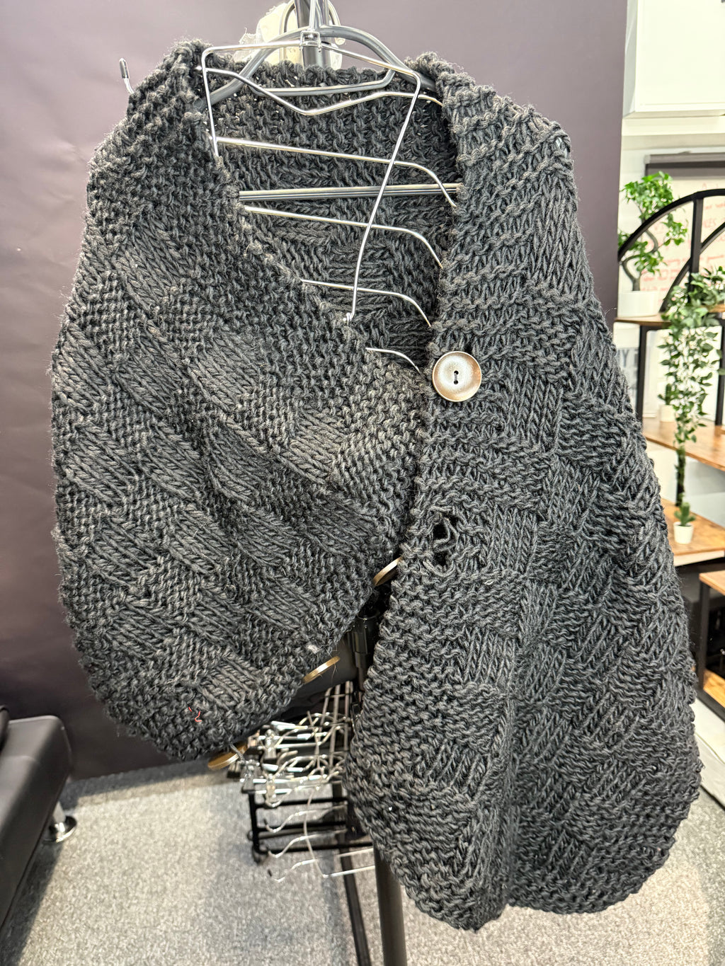 Black knit wrap/shawl with button fastening