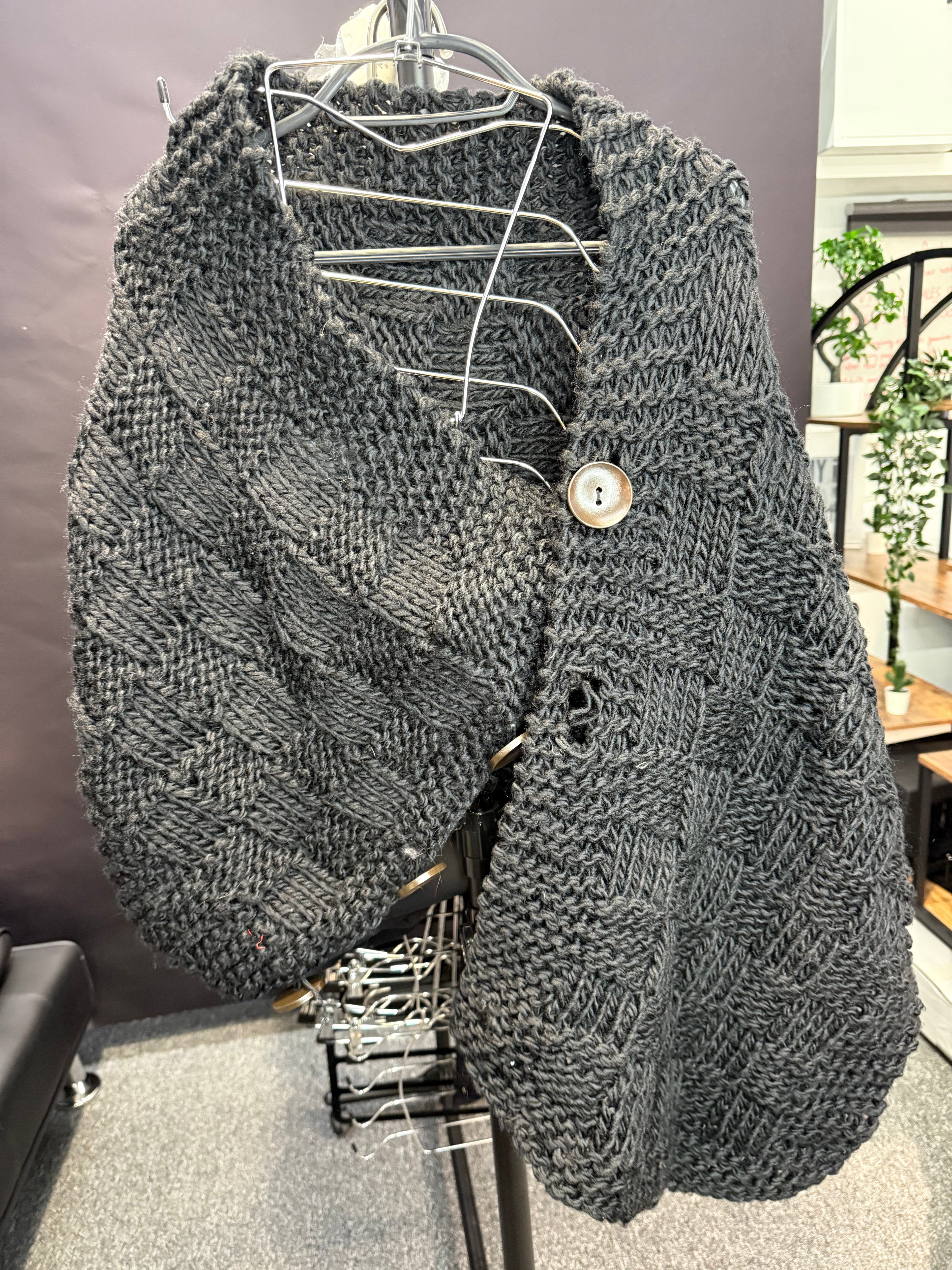 Black knit wrap/shawl with button fastening