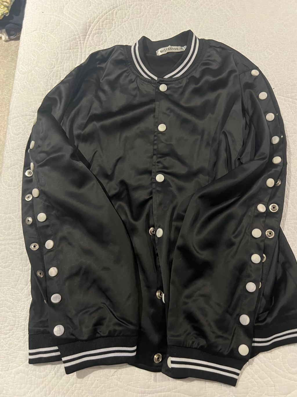 Black jacket with button up sleeves